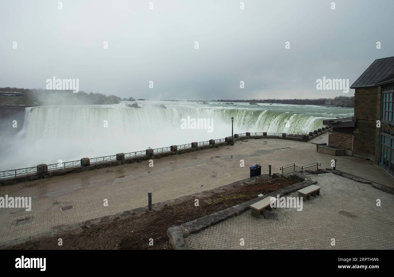 200415 -- NIAGARA FALLS, April 15, 2020 -- Niagara Falls with no visitors is seen from the Canadian side in Niagara Falls, Ontario, Canada, on April 15, 2020. Canadian Prime Minister Justin Trudeau announced Wednesday expanded eligibility rules for the Canada Emergency Response Benefit CERB so that part-time and seasonal workers can claim the CERB. As of Wednesday afternoon, there were 28,206 confirmed COVID-19 cases and 1,007 deaths across the country. Photo by /Xinhua CANADA-ONTARIO-NIAGARA FALLS-COVID-19-ECONOMY ZouxZheng PUBLICATIONxNOTxINxCHN Stock Photo