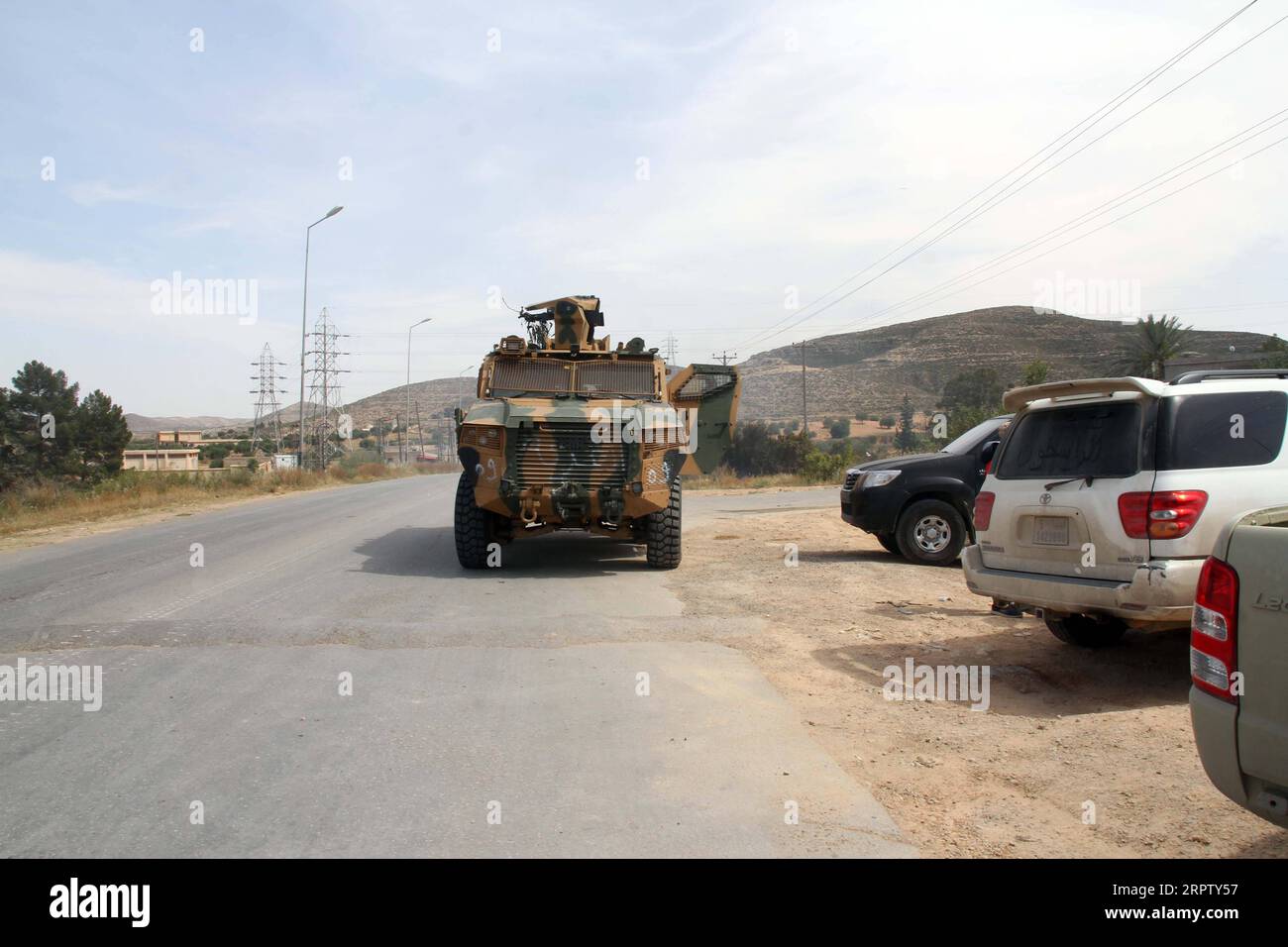 200419 -- TRIPOLI, April 19, 2020 Xinhua -- A vehicle of UN-backed Government of National Accord GNA is seen in Tarhuna, some 90 kilometers south of the capital Tripoli, Libya, April 18, 2020. The UN-backed Libyan government said Saturday it launched a massive attack on the rival east-based army in Tarhuna city, killing eight soldiers of the army and capturing more than 100 others. The government s forces said they launched 17 airstrikes on the east-based army positions in Tarhuna, seizing a number of military vehicles. Photo by Hamza Turkia/Xinhua LIBYA-TRIPOLI-ATTACK PUBLICATIONxNOTxINxCHN Stock Photo