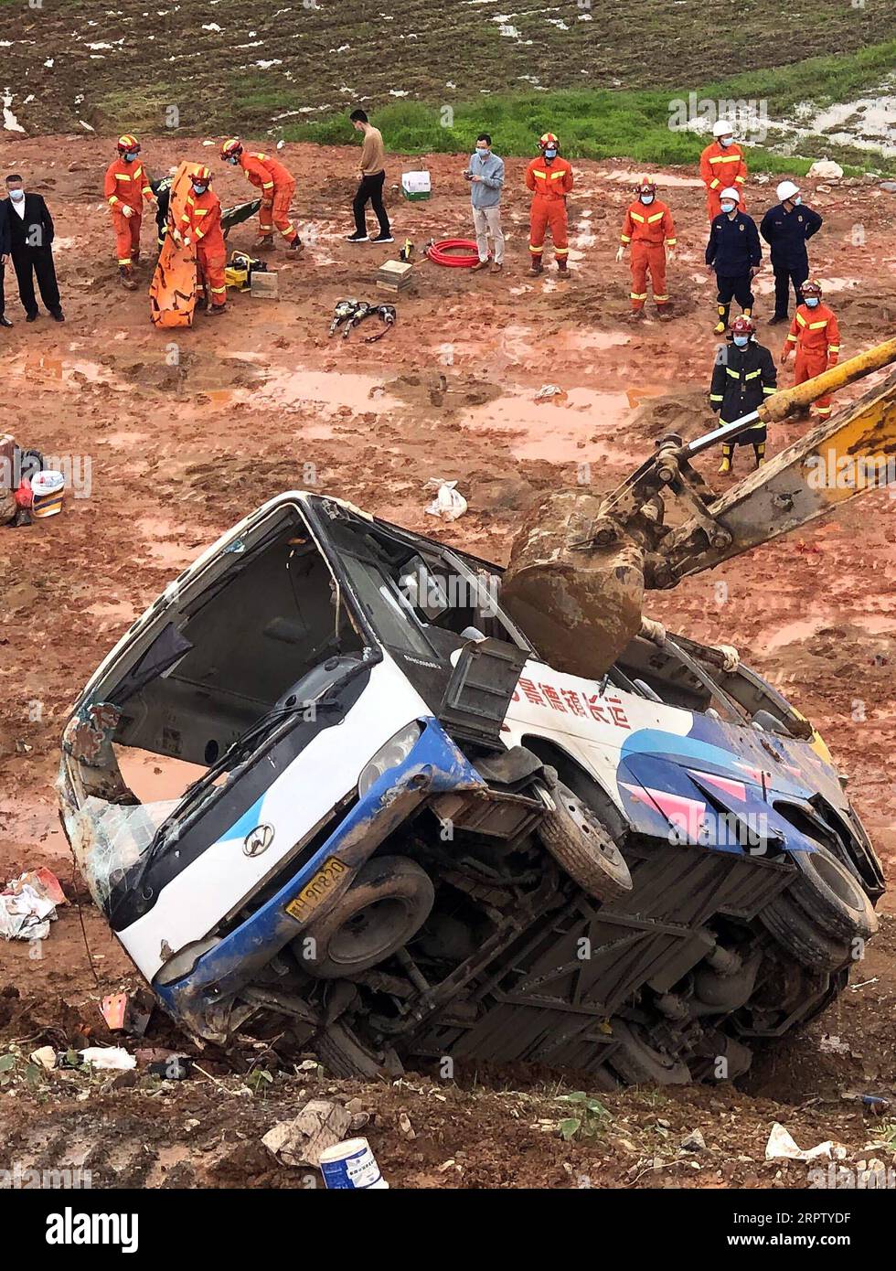 200419 -- NANCHANG, April 19, 2020 Xinhua -- Rescuers work at the site of a bus accident in Leping City, east China s Jiangxi Province, April 19, 2020. Six people were killed and 12 others injured in a road accident Sunday morning in east China s Jiangxi Province, local authorities said. A mini bus with 19 people on board rolled off a national road for about 30 meters into a ditch at 8:30 a.m. 0030 GMT in the city of Leping, according to the publicity department of the city. Xinhua SPOT NEWSCHINA-JIANGXI-LEPING-ROAD ACCIDENT CN PUBLICATIONxNOTxINxCHN Stock Photo