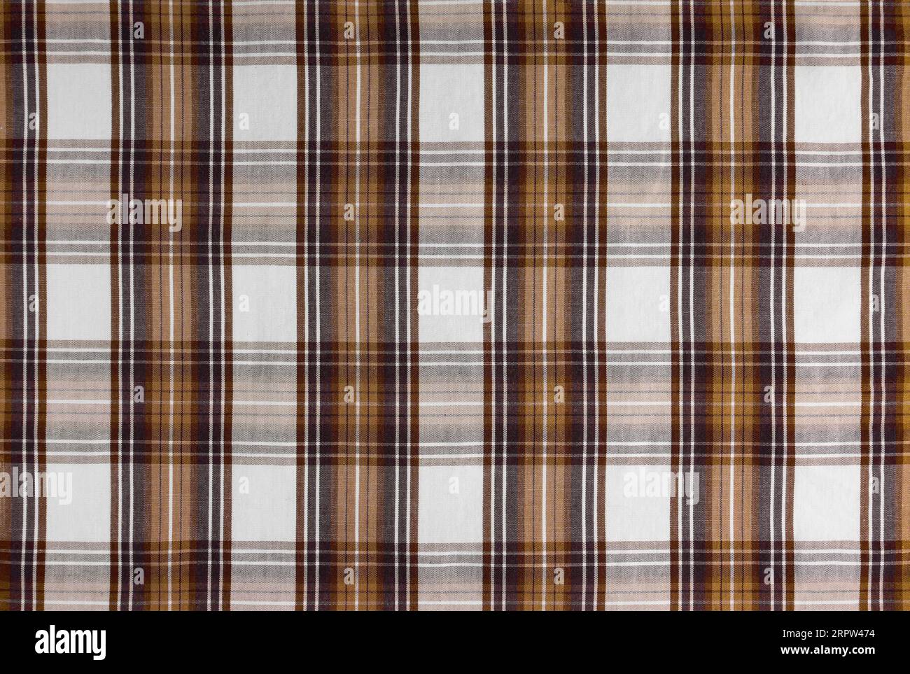Brown checkered texture fabric, tartan pattern. Shirt fabric, tablecloth textile, linen plaid cloth, classic scottish check pattern. Backdrop, wallpap Stock Photo