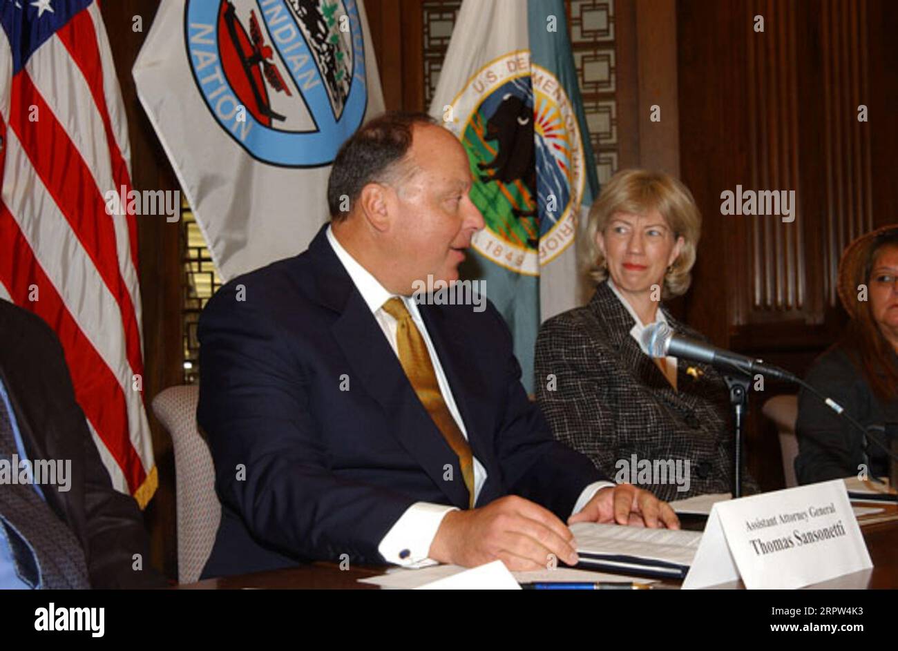 Assistant Attorney General for Environmental and Natural Resources, Thomas Sansonetti, Secretary Gale Norton, and President of the Quinault Indians, Pearl Capoeman-Baller, left to right, at signing event for agreement protecting forest habitat of marbled murrelet and other species in Washington state Stock Photo