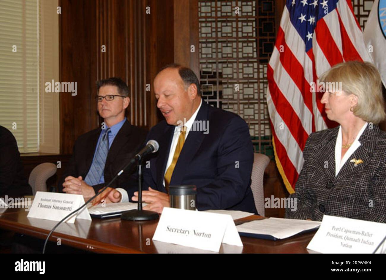 Court of Federal Claims Chief Judge Edward Damich, Assistant Attorney General for Environmental and Natural Resources, Thomas Sansonetti, and Secretary Gale Norton, left to right, at Department of Interior signing event for agreement protecting forest habitat of marbled murrelet in Washington state Stock Photo
