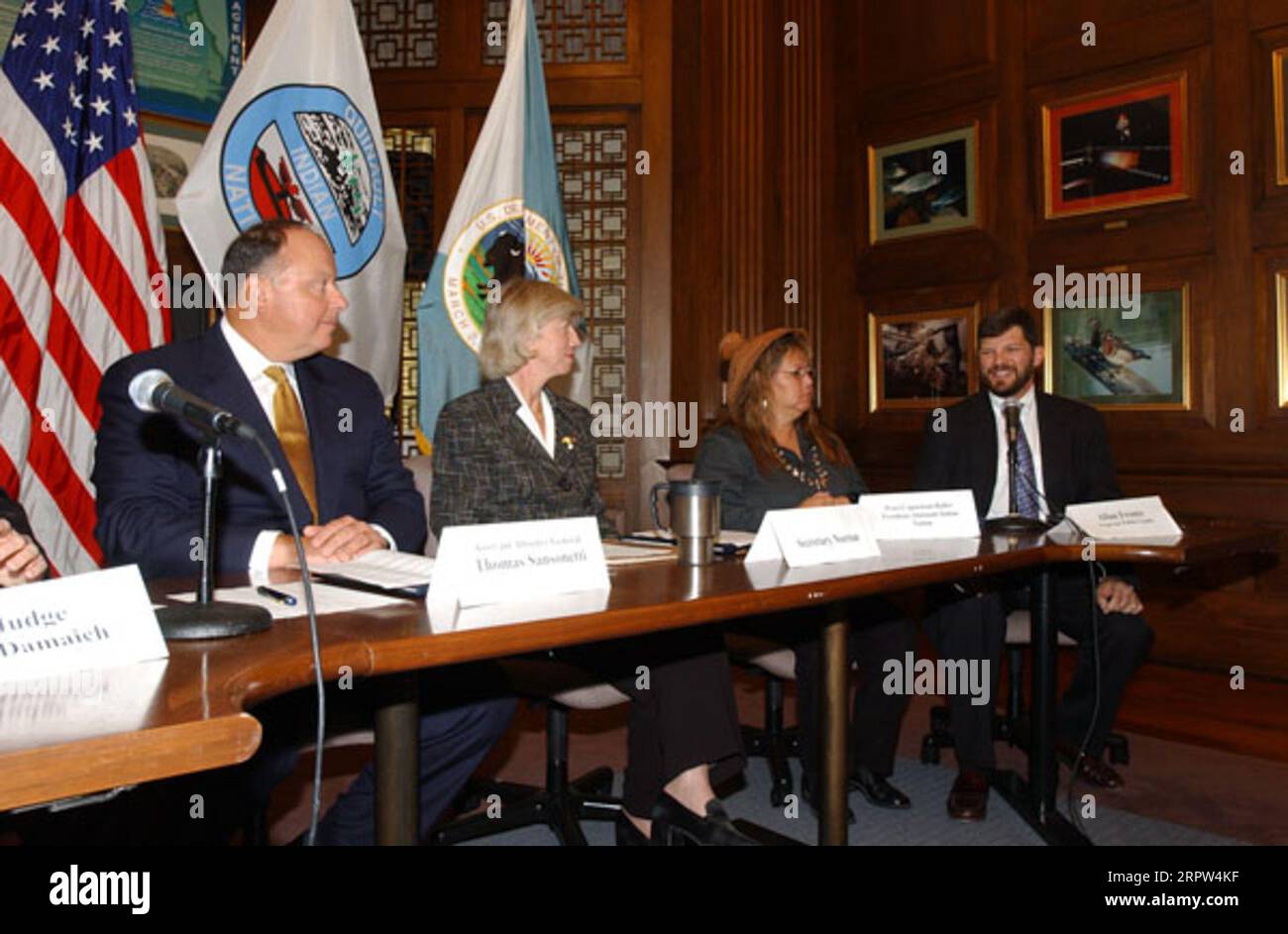 Assistant Attorney General for Environmental and Natural Resources, Thomas Sansonetti, Secretary Gale Norton, President of the Quinault Indian Nation, Pearl Capoeman-Baller, and Vice President of the Trust for Public Land, Alan Front, left to right, at signing event for forest habitat protection agreement Stock Photo