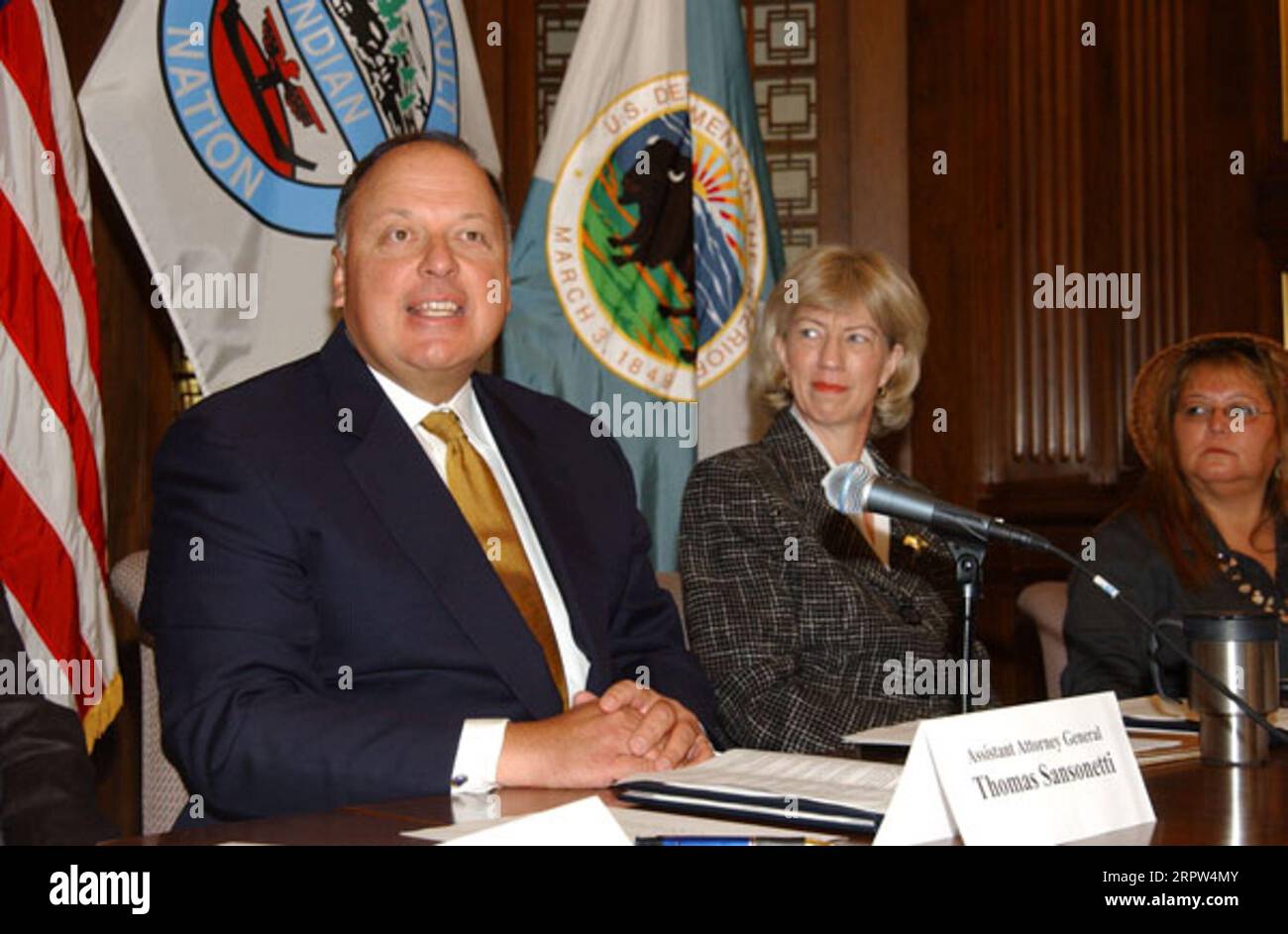 Assistant Attorney General for Environmental and Natural Resources, Thomas Sansonetti, Secretary Gale Norton, and President of the Quinault Indians, Pearl Capoeman-Baller, left to right, at signing event for agreement protecting forest habitat of marbled murrelet and other species in Washington state Stock Photo