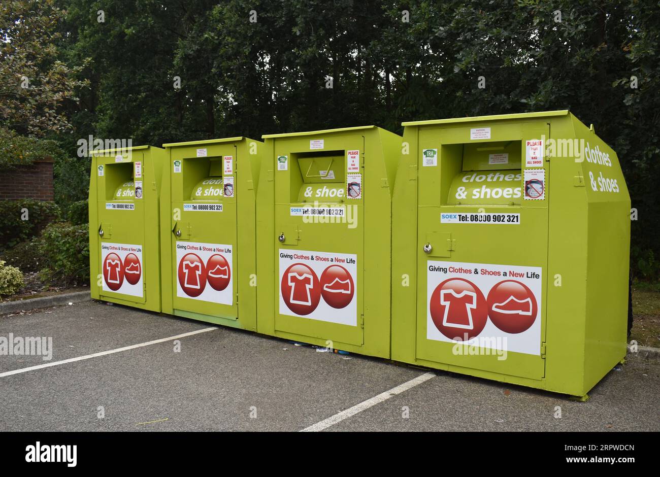 Four recycling banks for clothes and shoes at Waitrose supermarket in