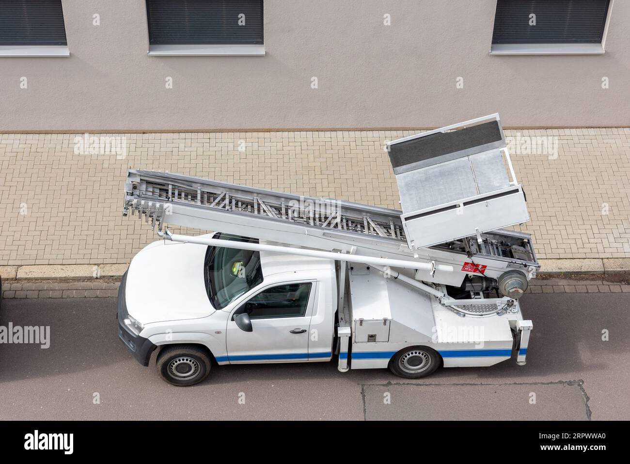 Mover service lifting ladder cargo crane platform vehicle van parked at