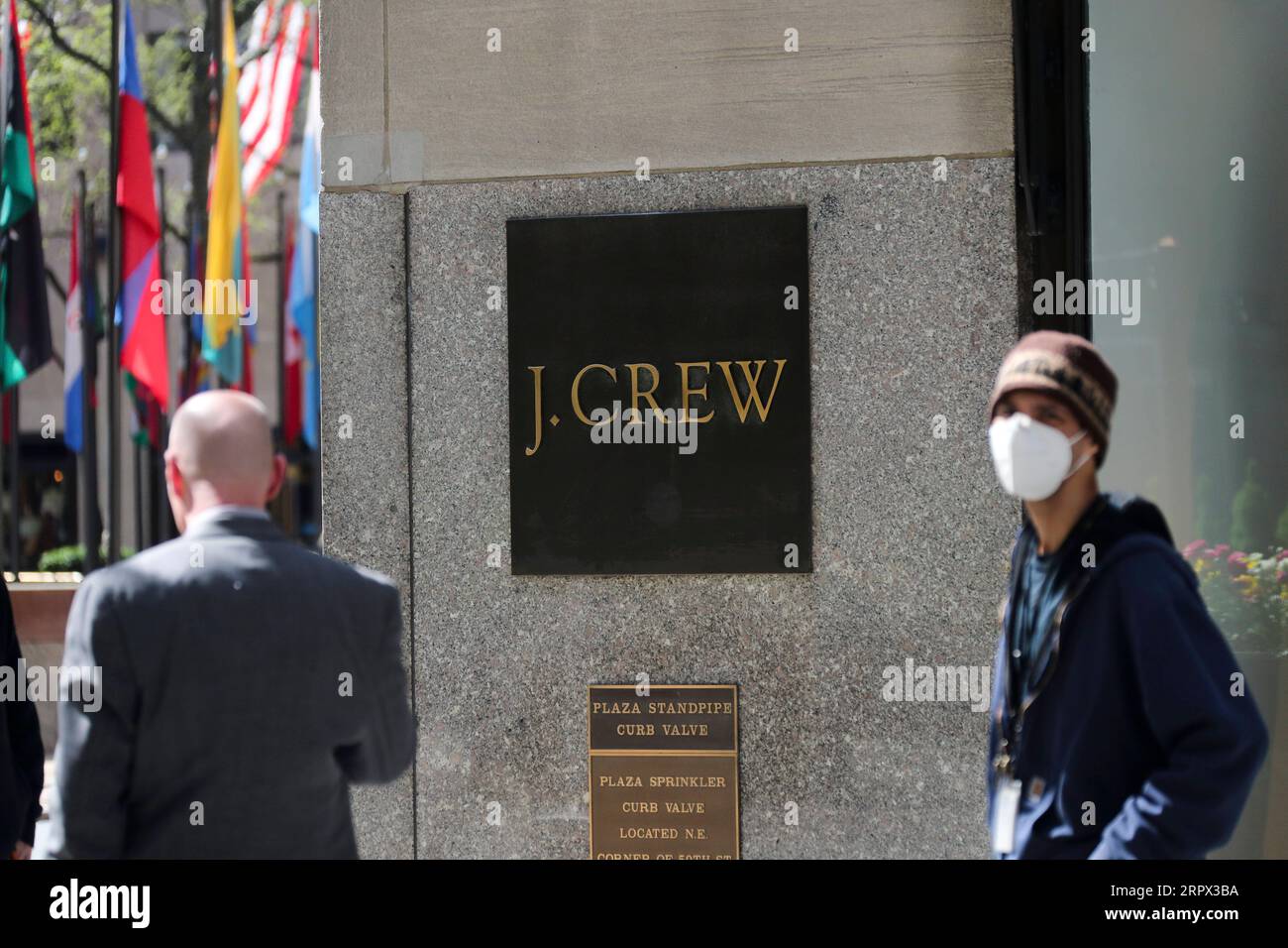 200505 -- NEW YORK, May 5, 2020 -- Pedestrians walk past a J.Crew store in Manhattan of New York, the United States, May 4, 2020. J. Crew Group, a U.S. apparel retailer which also operates the Madewell brand, has filed for bankruptcy protection, as the COVID-19 fallout continues to ripple through the nation. It has filed to begin Chapter 11 proceedings in the U.S. Bankruptcy Court for the Eastern District of Virginia, according to a statement by the company on Monday. The company said its lenders have agreed to convert approximately 1.65 billion U.S. dollars of its debt into equity.  U.S.-NEW Stock Photo