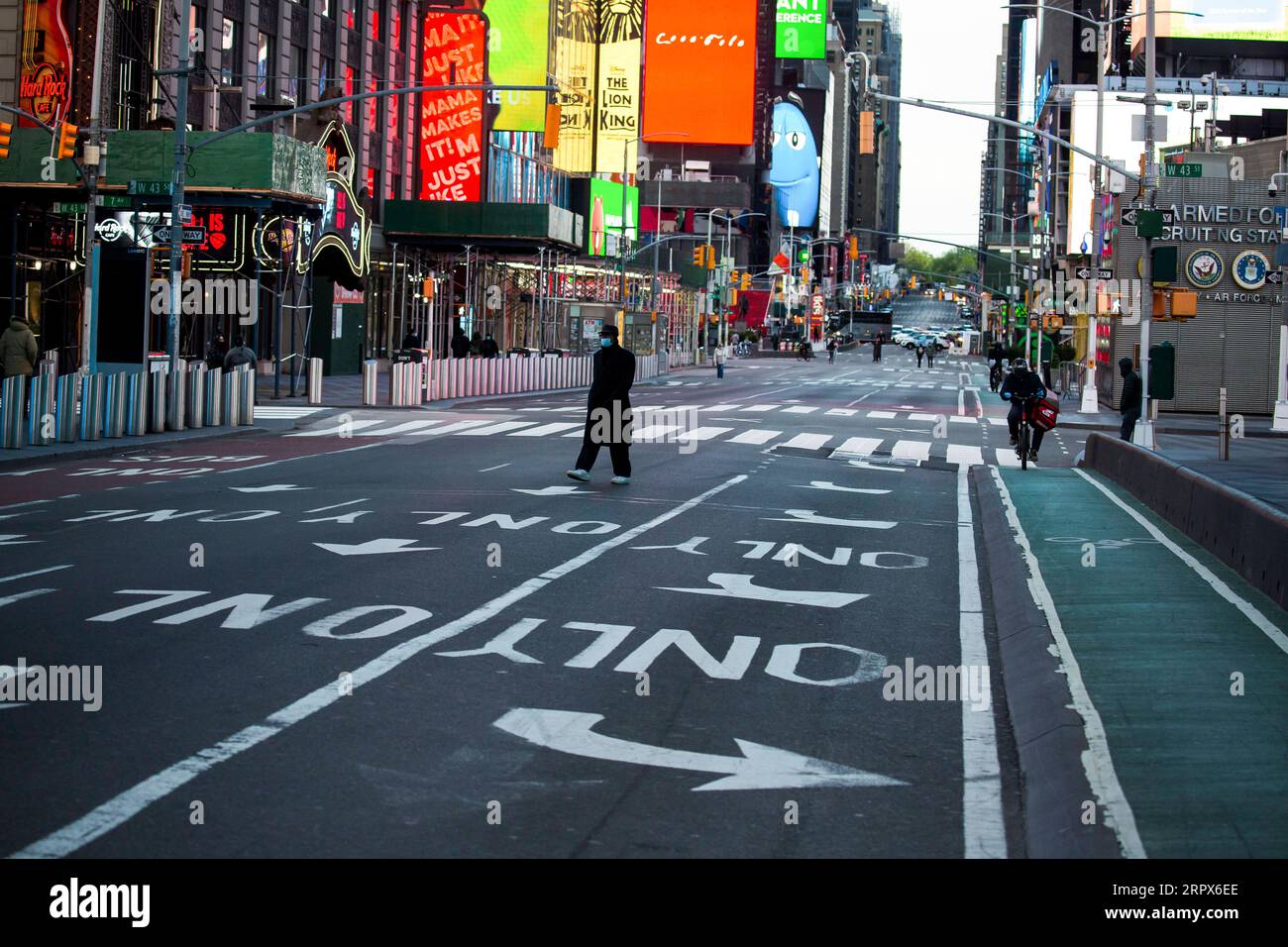 200510 -- NEW YORK, May 10, 2020 -- A pedestrian in face mask walks through Times Square amid the COVID-19 outbreak in New York, the United States, May 9, 2020. The number of COVID-19 cases in the United States reached 1,300,079 as of 3:32 p.m. 1932 GMT Saturday, according to the Center for Systems Science and Engineering CSSE at Johns Hopkins University. Meanwhile, the death toll from the disease in the country hit 78,320. Photo by /Xinhua U.S.-COVID-19 CASES-UPDATE MichaelxNagle PUBLICATIONxNOTxINxCHN Stock Photo