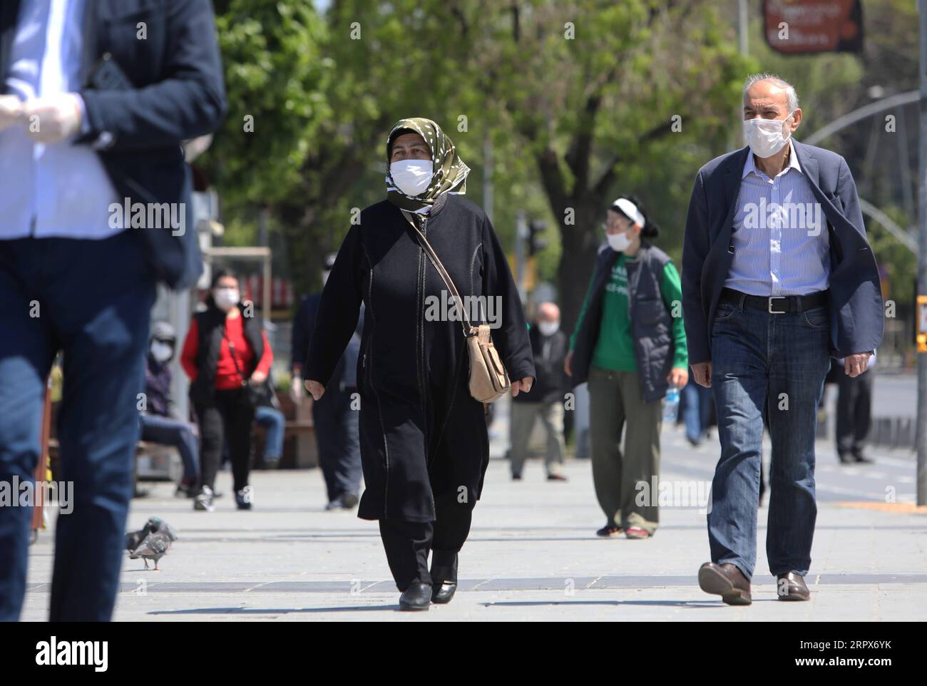 200510 -- ISTANBUL, May 10, 2020 Xinhua -- Elderlies walk on a street in Istanbul, Turkey, on May 10, 2020. Elderlies aged 65 and older across Turkey were allowed outside on Sunday for the first time in seven weeks in an easing of the coronavirus restrictions of the country. Turkey reported 1,542 new cases of COVID-19 and 47 new deaths in the past 24 hours, Health Minister Fahrettin Koca said Sunday. Photo by Osman Orsal/Xinhua TURKEY-ISTANBUL-COVID-19-ELDERLIES PUBLICATIONxNOTxINxCHN Stock Photo