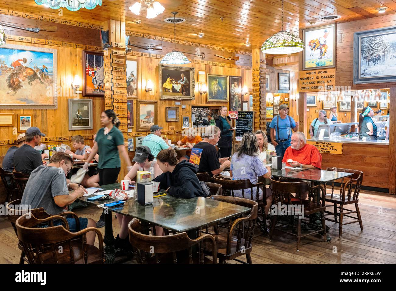Tourists explore Wall Drug Store; Third Generation family business