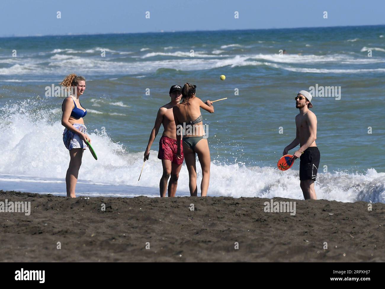 200524 -- LADISPOLI ITALY, May 24, 2020 Xinhua -- People have fun on the beach in Ladispoli, near Rome, Italy, May 24, 2020. A further 50 COVID-19 patients had died in the past 24 hours in Italy, bringing the country s death toll to 32,785, out of total infection cases of 229,858, according to fresh figures on Sunday. The number of recoveries rose to 140,479, an increase of 1,639 compared to Saturday. Xinhua ITALY-LADISPOLI-COVID-19-RECOVERIES PUBLICATIONxNOTxINxCHN Stock Photo