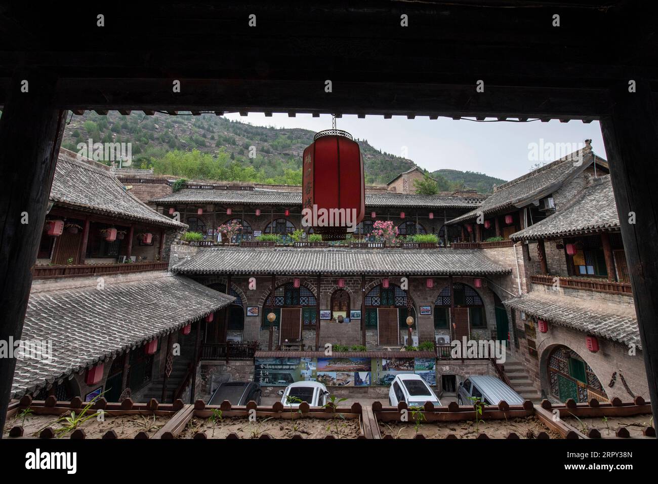 200612 -- LINXIAN, June 12, 2020 -- Photo taken on June 12, 2020 shows a traditional Chinese style hotel at the Qikou ancient town in Linxian County of Lyuliang, north China s Shanxi Province.  CHINA-SHANXI-LINXIAN-ANCIENT TOWN-VIEW CN YangxChenguang PUBLICATIONxNOTxINxCHN Stock Photo