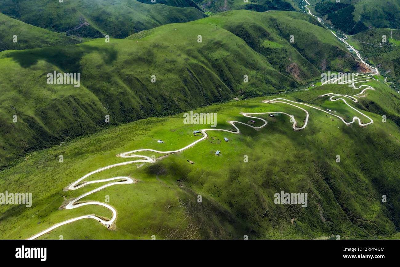 200614 -- RANGTANG, June 14, 2020 -- Aerial photo taken on June 13, 2020 shows a plateau highway in Rangtang County of Aba Tibetan and Qiang Autonomous Prefecture, southwest China s Sichuan Province. The 34-kilometer plateau highway is part of a poverty relief plan under the Ministry of Transport aimed at improving local infrastructure in Rangtang County. The whole project is expected to be completed by July 2020.  CHINA-SICHUAN-RANGTANG-INFRASTRUCTURE-PLATEAU HIGHWAY CN ShenxBohan PUBLICATIONxNOTxINxCHN Stock Photo