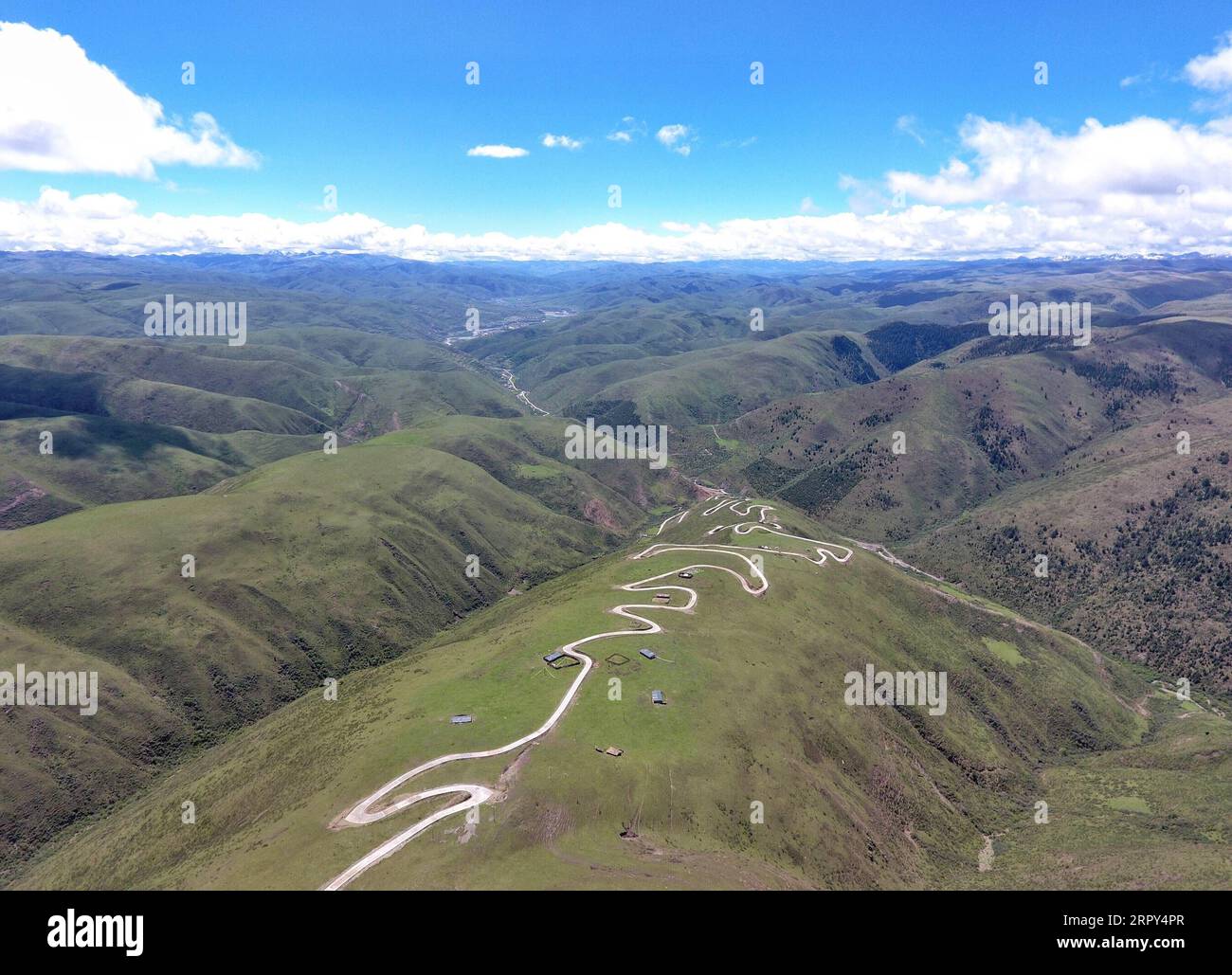 200614 -- RANGTANG, June 14, 2020 -- Aerial photo taken on June 13, 2020 shows a plateau highway in Rangtang County of Aba Tibetan and Qiang Autonomous Prefecture, southwest China s Sichuan Province. The 34-kilometer plateau highway is part of a poverty relief plan under the Ministry of Transport aimed at improving local infrastructure in Rangtang County. The whole project is expected to be completed by July 2020.  CHINA-SICHUAN-RANGTANG-INFRASTRUCTURE-PLATEAU HIGHWAY CN LiuxKun PUBLICATIONxNOTxINxCHN Stock Photo