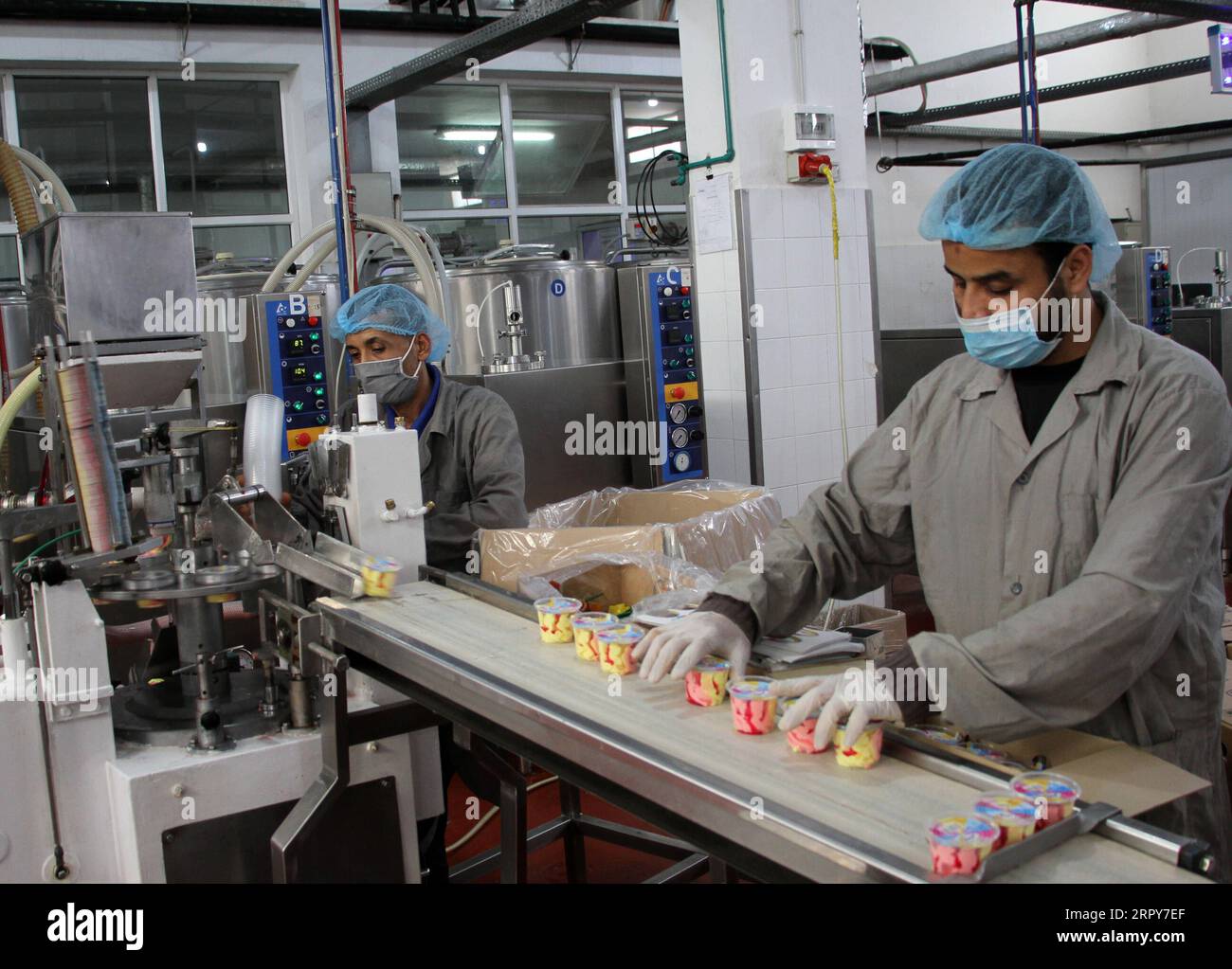 200618 GAZA, June 18, 2020 Xinhua Palestinian workers make ice