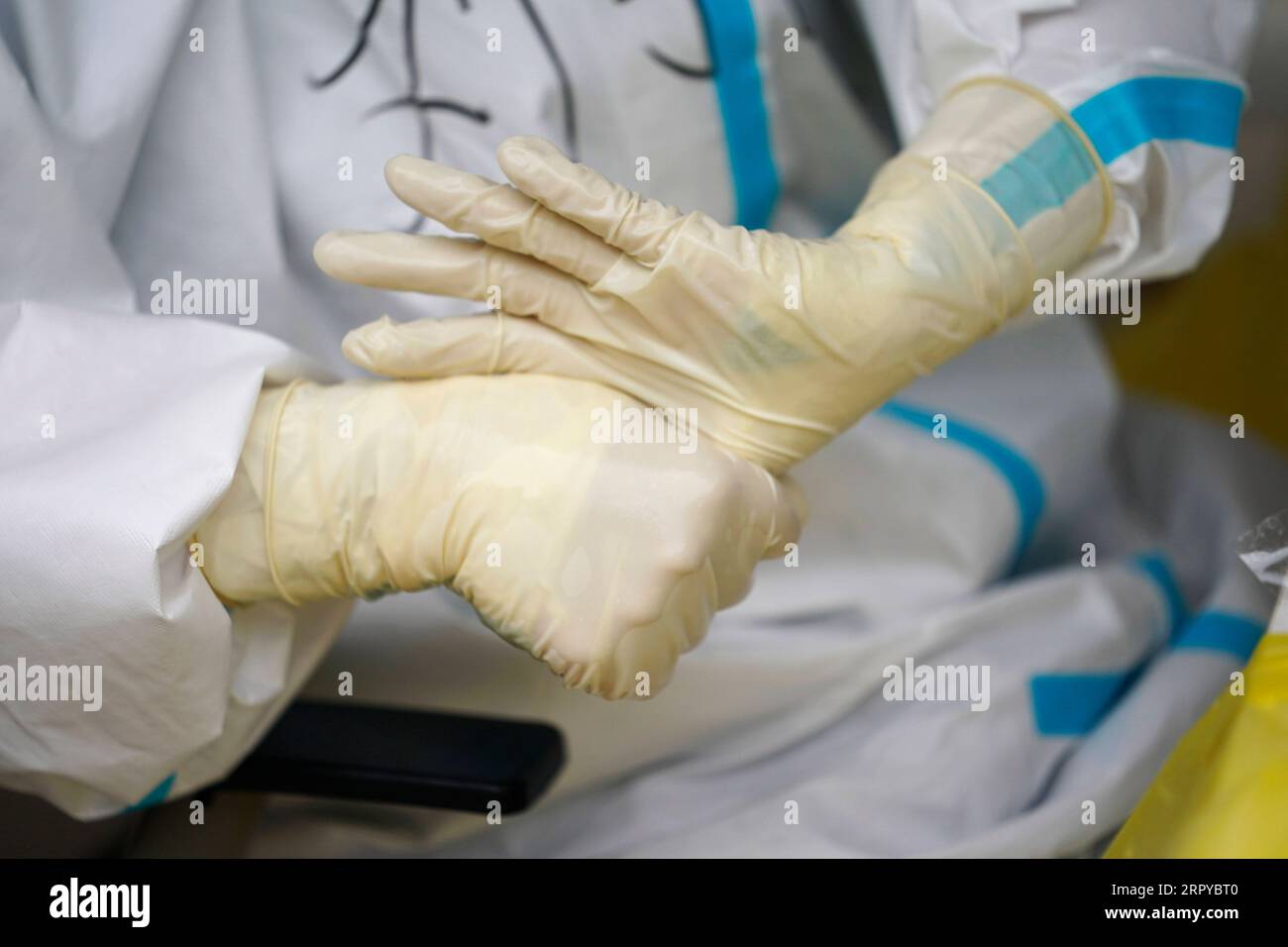 200624 -- BEIJING, June 24, 2020 -- A medical worker works at a nucleic ...