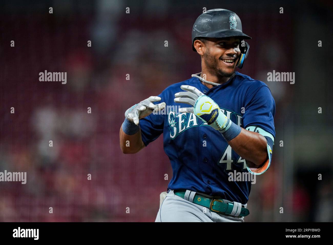 Seattle Mariners' Julio Rodriguez gestures while running the bases