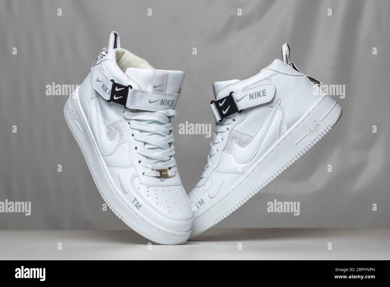 Kyiv, Ukraine - September 5, 2023: Nike Air Force white sneakers product  shot isolated on light gray background Stock Photo - Alamy