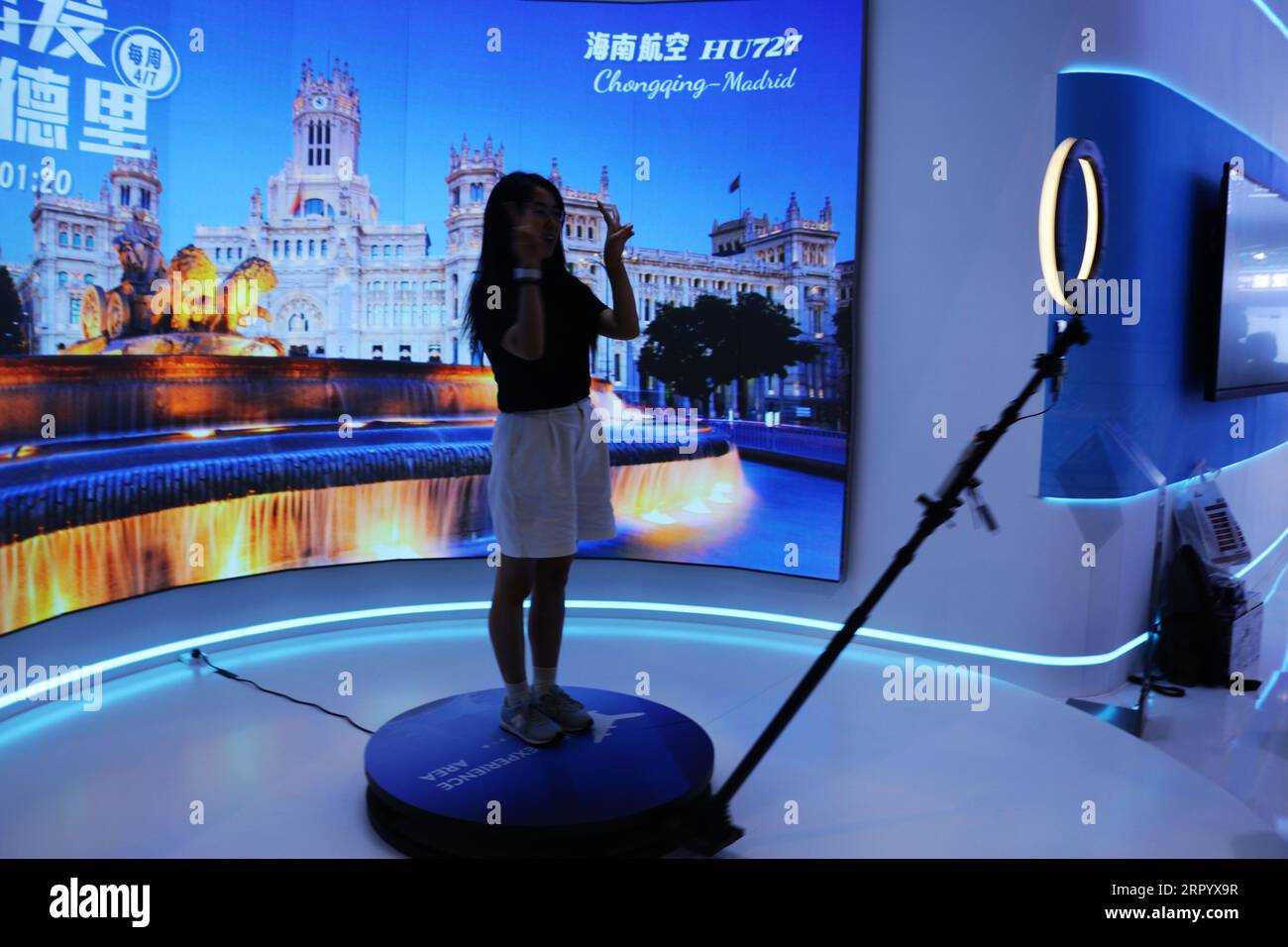 CHONGQING, CHINA - SEPTEMBER 5, 2023 - A citizen experiences rotating