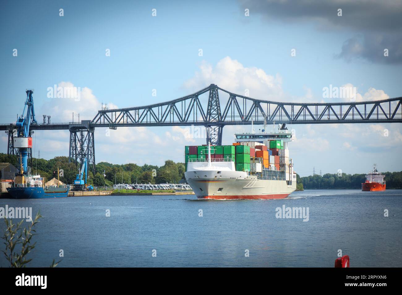 a container ship passes under the Rendsburg high bridge Stock Photo - Alamy