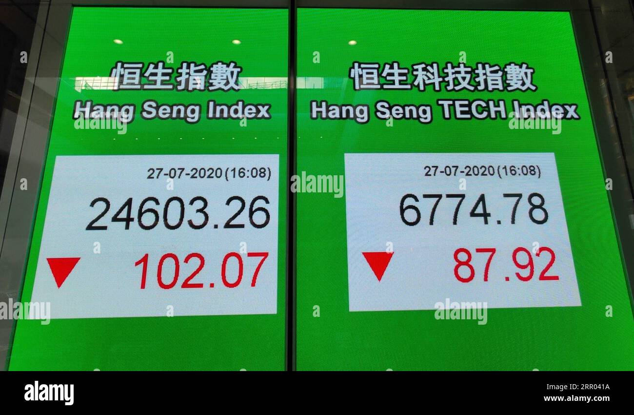 200727 -- HONG KONG, July 27, 2020 -- Photo taken on July 27, 2020 shows a screen displaying the Hang Seng Index and the Hang Seng Tech Index in Hong Kong, south China. The Hang Seng Tech Index tracking tech giants listed in Hong Kong was launched on Monday as the world s top fund-raising center is striving to attract more tech firms and reinforce its position amid global volatility.  CHINA-HONG KONG-HANG SENG TECH INDEX CN WangxShen PUBLICATIONxNOTxINxCHN Stock Photo