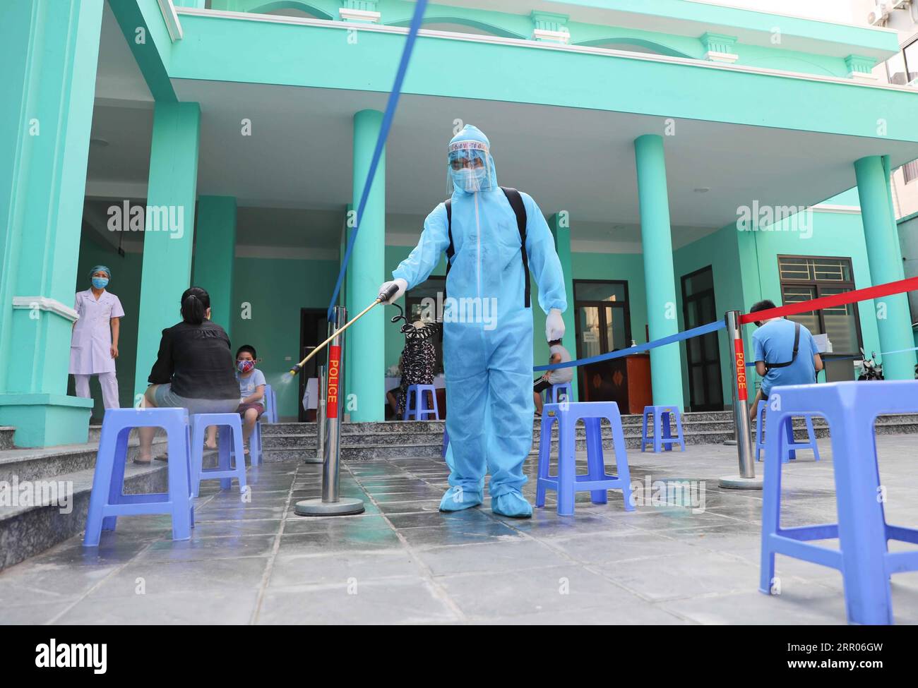 200731 -- HANOI, July 31, 2020 Xinhua -- A staff member disinfects at a health station in Hanoi, Vietnam, July 30, 2020. Vietnam recorded 45 new domestically transmitted COVID-19 cases on Friday morning, bringing its total confirmed cases to 509, according to its Ministry of Health. VNA/Handout via Xinhua VIETNAM-COVID-19-CASES PUBLICATIONxNOTxINxCHN Stock Photo