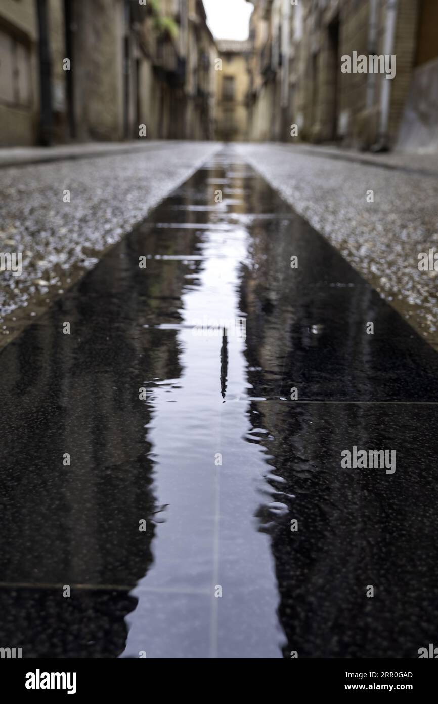 Detail of urban ground wet from the rain Stock Photo Alamy