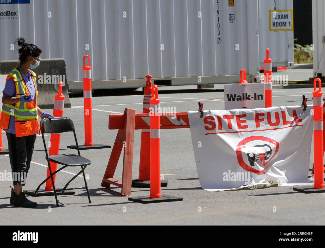 200814 VANCOUVER, Aug. 14, 2020 A Site Full poster is displayed