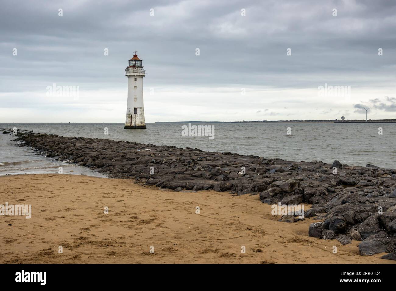 New Brighton Lighthouse or Perch Rock Lighthouse, a decommissioned lighthouse situated at the confluence of the River Mersey and Liverpool Bay. Stock Photo