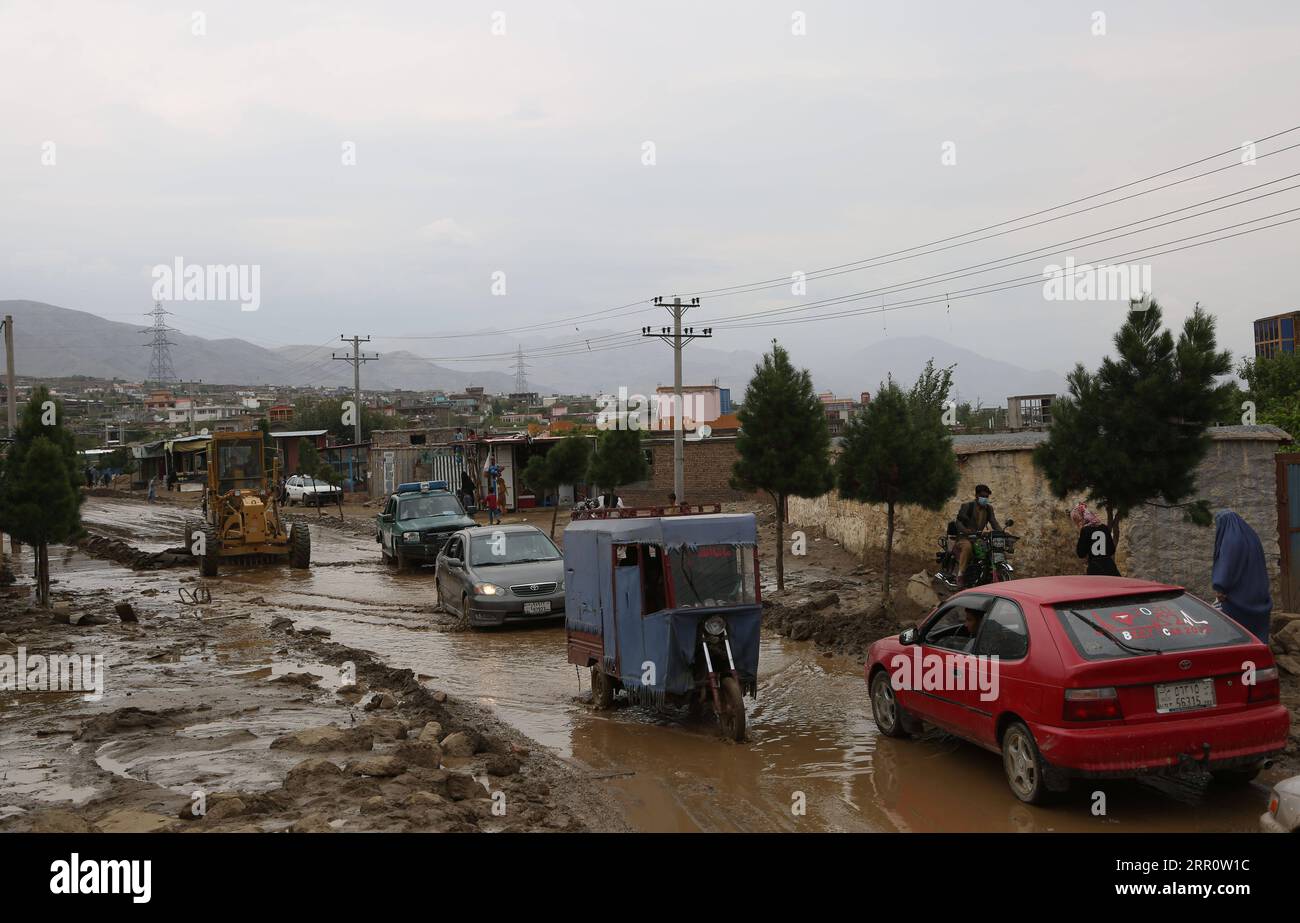 200826 -- PARWAN, Aug. 26, 2020 -- Vehicles wade through a flooded road in Charikar, Parwan province, Afghanistan, Aug. 26, 2020. The death toll of floods during Tuesday night in Afghanistan s eastern Parwan province climbed to 73 with 100 others injured, the provincial government spokesperson confirmed Wednesday. Photo by /Xinhua AFGHANISTAN-PARWAN-FLOOD RahmatullahxAlizadah PUBLICATIONxNOTxINxCHN Stock Photo