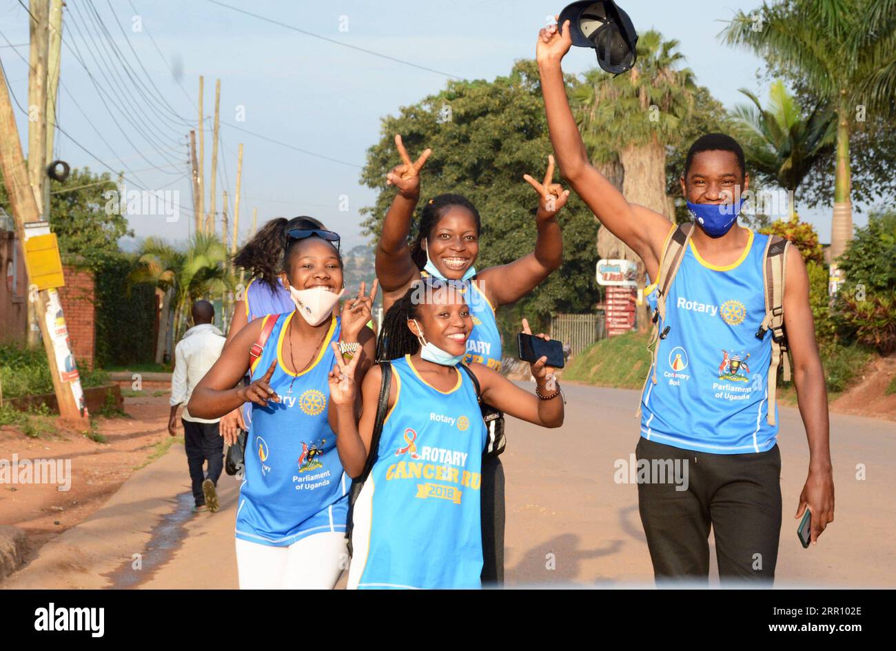 200830 -- KAMPALA, Aug. 30, 2020 -- Runners celebrate during the 2020 Virtual Rotary Cancer Marathon Run in Kampala, capital of Uganda, Aug. 30, 2020. The 2020 Rotary Cancer Marathon Run was held virtually due to COVID-19 pandemic.  UGANDA-KAMPALA-COVID-19-2020 VIRTUAL ROTARY CANCER RUN NicholasxKajoba PUBLICATIONxNOTxINxCHN Stock Photo