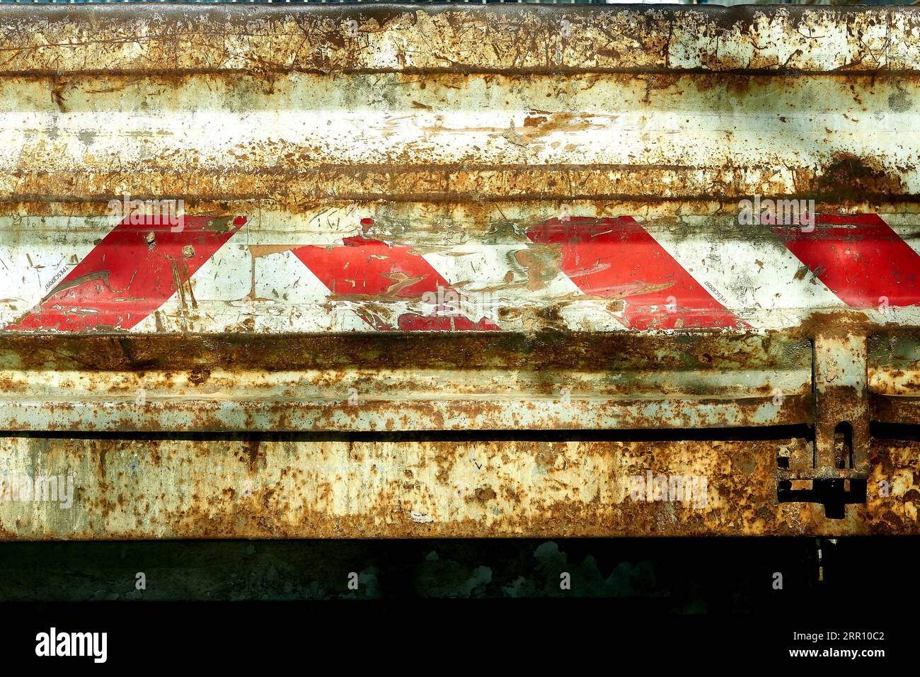 Old rusty iron metal wall,board with red and white fencing pattern ...