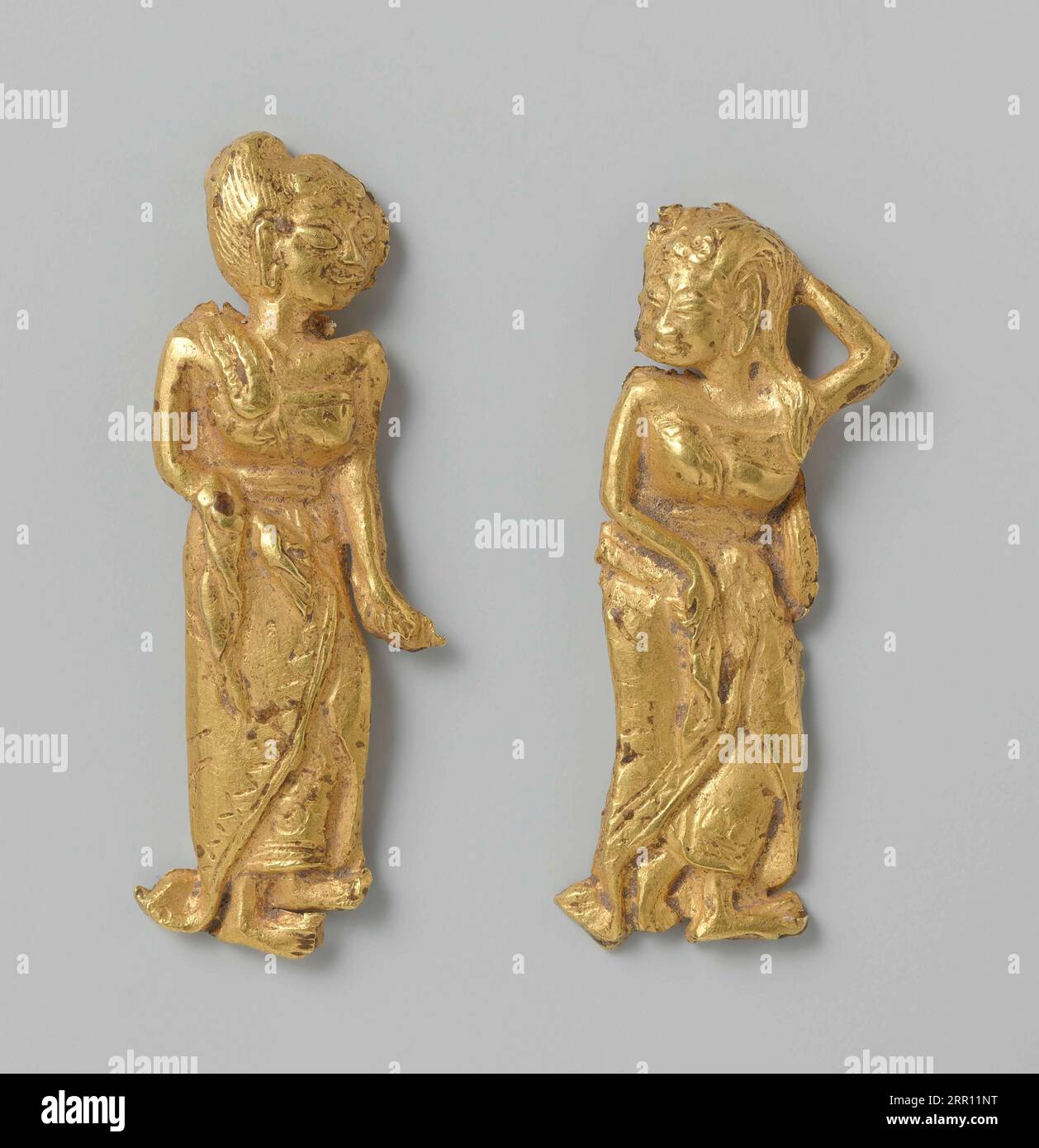 Couple female figurines, East Java, ca. 1300 - ca. 1 400, gold, Stock Photo
