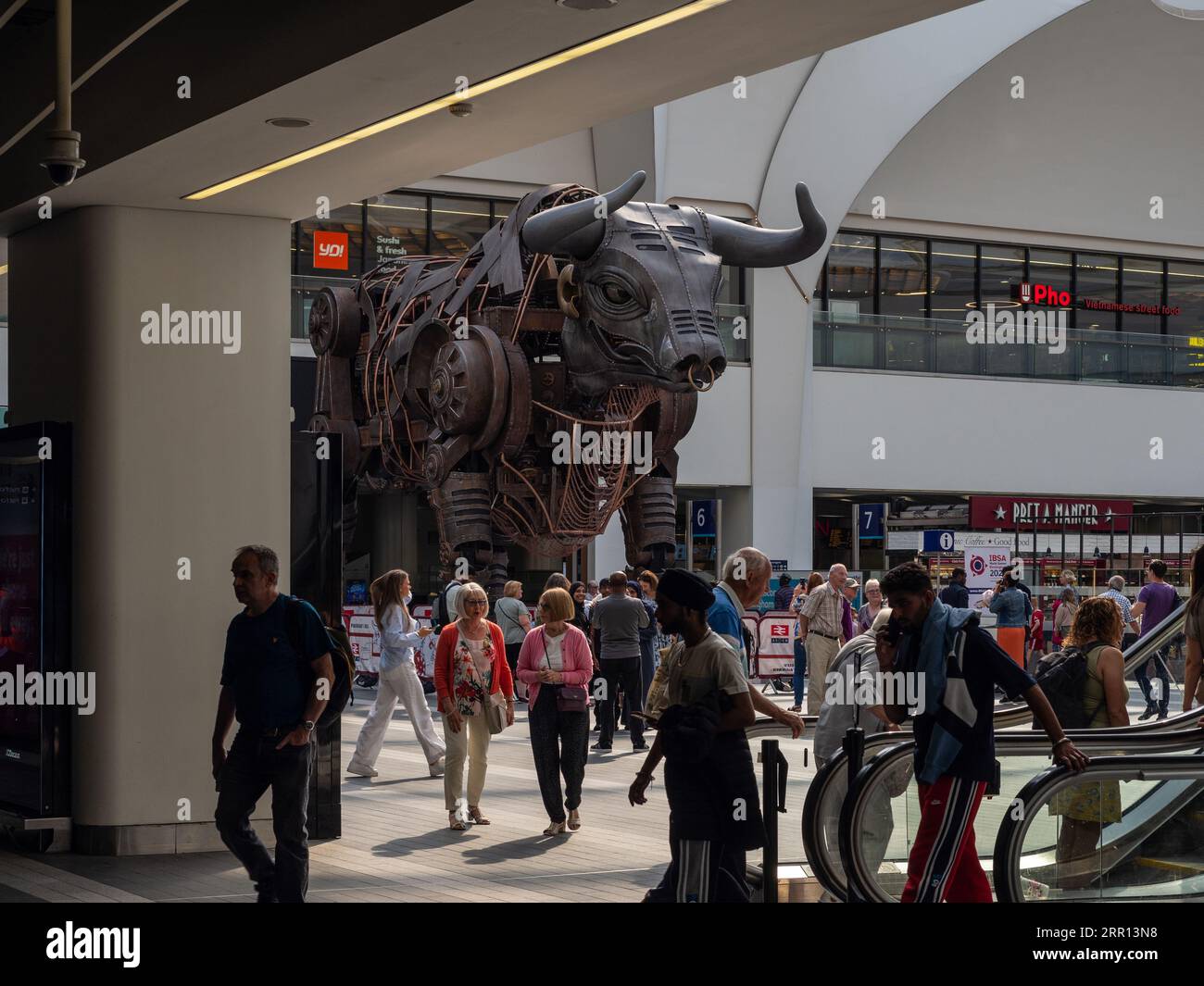 Ozzy the bull, a 10m high mechanical sculpture, Grand Central, New Street station, Birmingham, UK Stock Photo