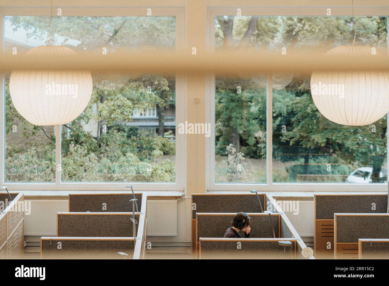 Female student studying in library at university Stock Photo