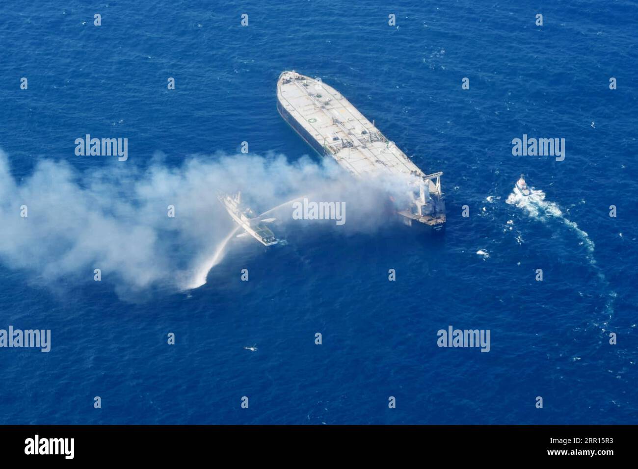 200905 -- COLOMBO, Sept. 5, 2020  -- Fireboats extinguish fire of an oil tanker in the seas off Sri Lanka s eastern coast, on Sept. 5, 2020. The distressed oil tanker MT New Diamond which caught fire in the seas off Sri Lanka s eastern coast on Thursday has been towed 40 nautical miles away from shore and the fire is under control, the Sri Lanka navy said here Saturday. Sri Lanka Air Force Media/Handout via  SRI LANKA-OIL TANKER-FIRE Xinhua PUBLICATIONxNOTxINxCHN Stock Photo