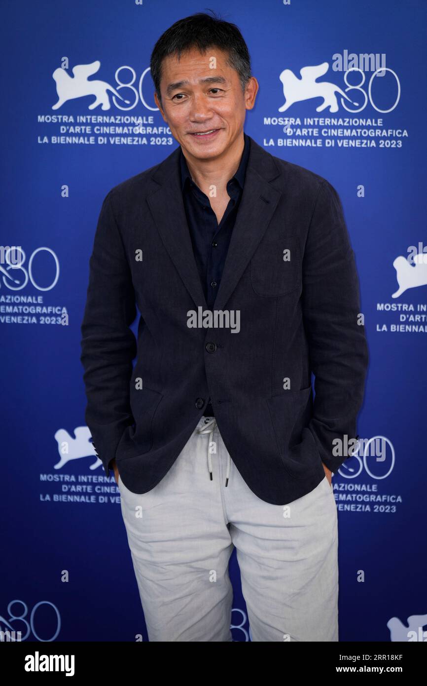 Venice, Italy. 02nd Sep, 2023. Tony Leung Chiu-Wai attends a photocall for the Golden Lion For Lifetime Achievement & ''The Lion's Share: A History Of The Mostra'' at the 80th Venice International Film Festival on September 02, 2023 in Venice, Italy. (Photo by Daniele Cifala/NurPhoto) Credit: NurPhoto SRL/Alamy Live News Stock Photo