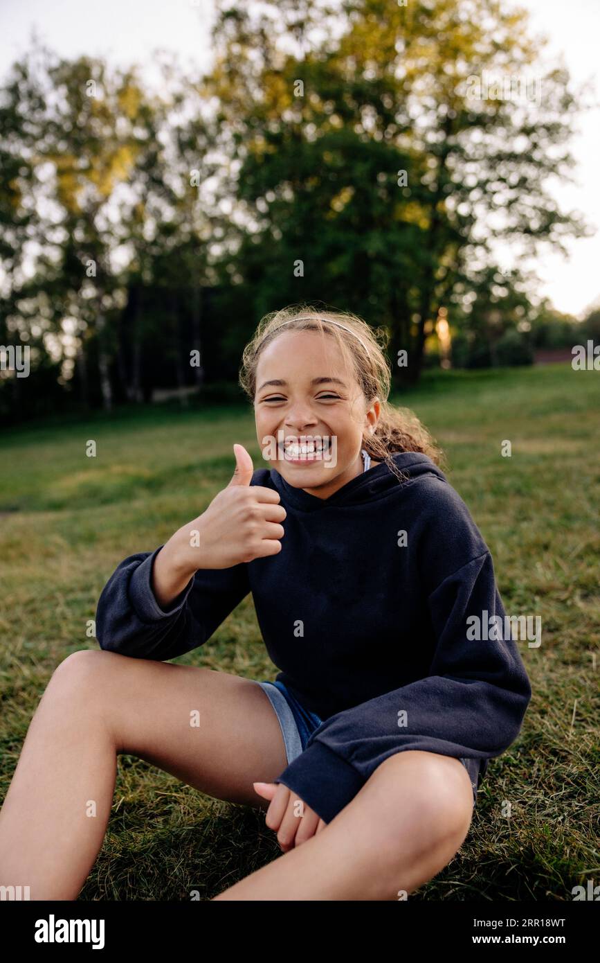 Happy girl 10 thumbs up hi-res stock photography and images - Alamy