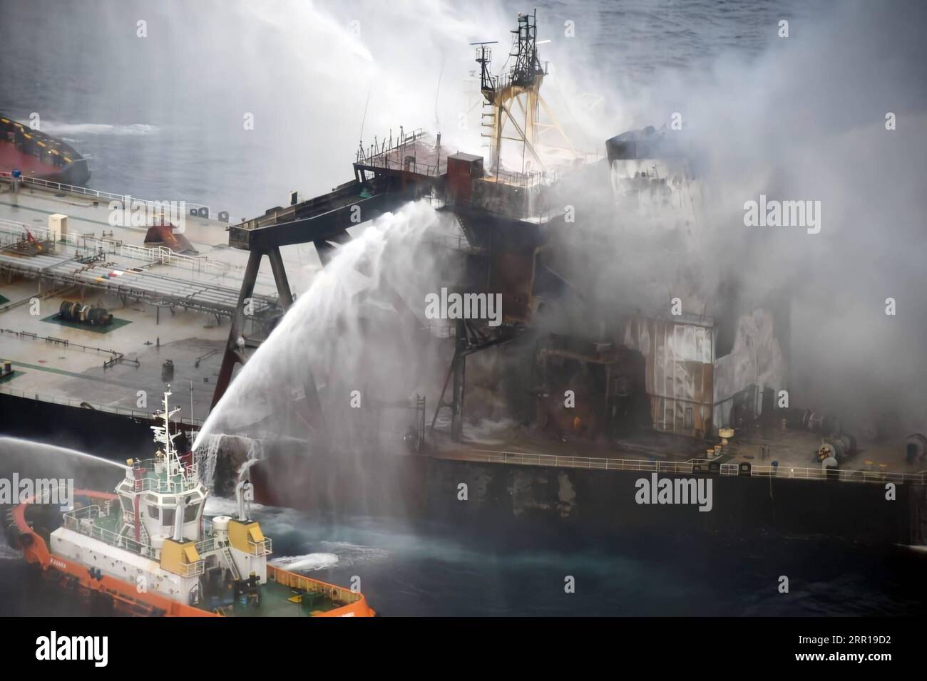 200909 -- COLOMBO, Sept. 9, 2020 -- Fireboats extinguish fire of the MT New Diamond oil tanker in the seas off Sri Lanka s eastern coast, on Sept. 8, 2020. The Sri Lanka Navy on Wednesday said a fire which had reignited onboard the MT New Diamond oil tanker on Monday has been brought under control and the distressed ship was being towed further away towards safe waters by a tug boat. /Handout via Xinhua SRI LANKA-OIL TANKER-FIRE SrixLankaxAirxForcexMedia PUBLICATIONxNOTxINxCHN Stock Photo