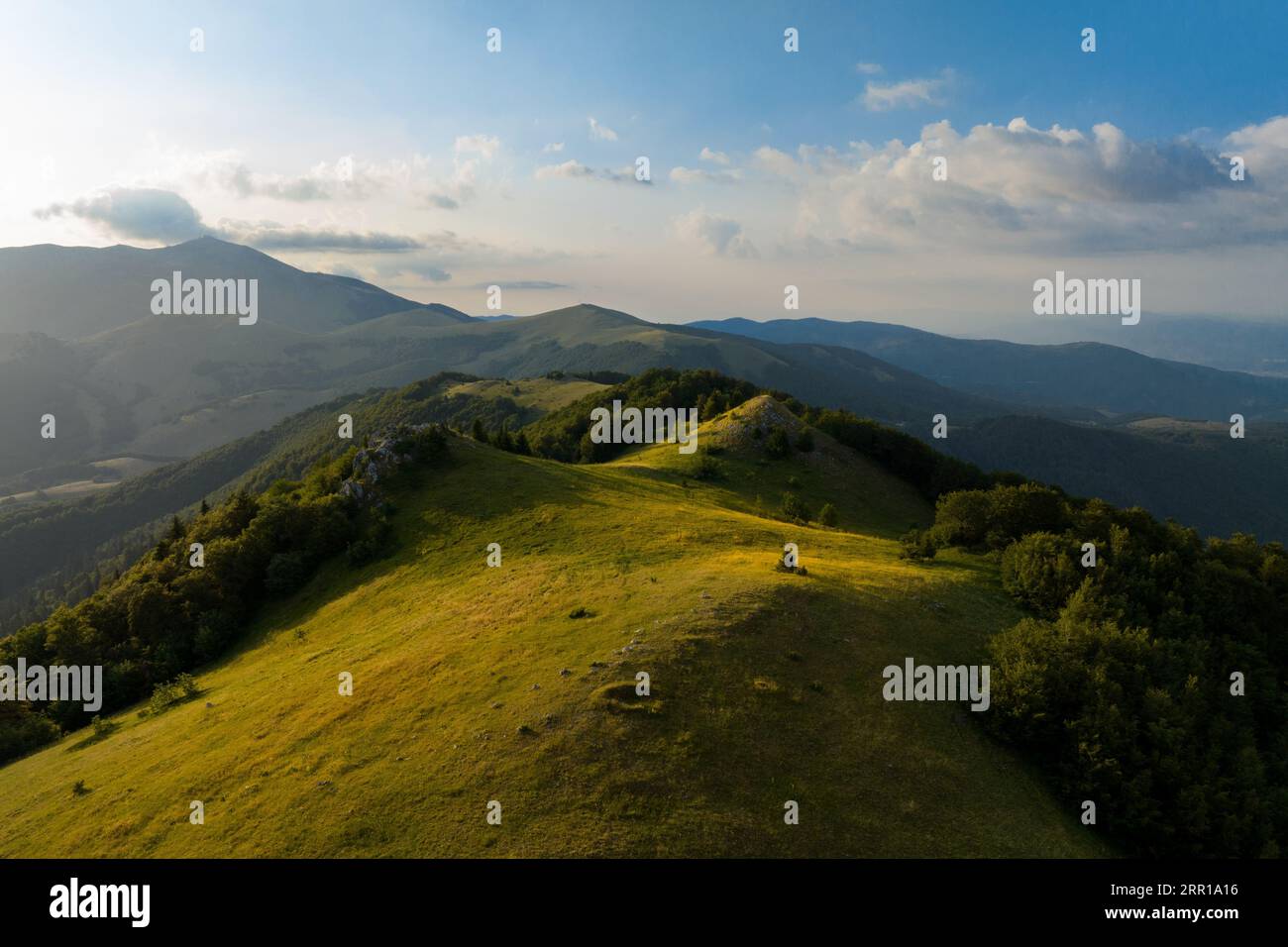 An aerial view of green hills on a sunny day Stock Photo - Alamy