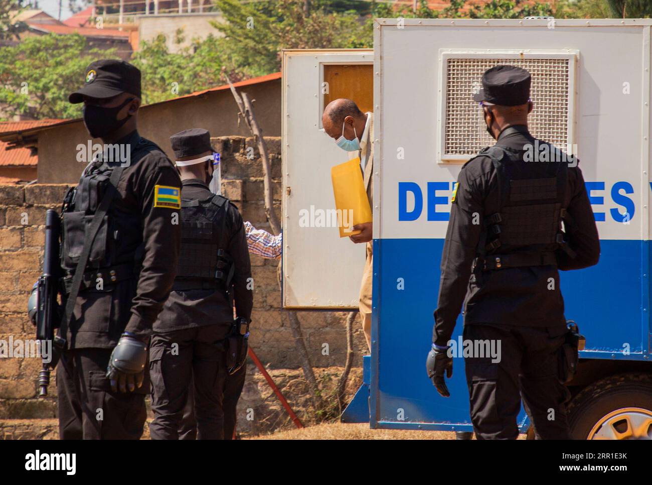 200915 -- KIGALI, Sept. 15, 2020 -- Paul Rusesabagina C, Back, portrayed as a humanitarian in the controversial Oscar-nominated film Hotel Rwanda, gets off a van in Kigali, Rwanda, on Sept. 14, 2020. Rusesabagina on Monday declined to plead guilty or not guilty to 13 charges against him during a pre-trial hearing, which was his first appearance in court after being arrested. Photo by /Xinhua RWANDA-KIGALI-HOTEL RWANDA-PAUL RUSESABAGINA-HEARING CyrilxNdegeya PUBLICATIONxNOTxINxCHN Stock Photo