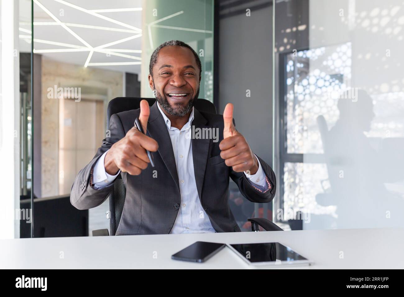 Webcam video call view man inside office at workplace looking at