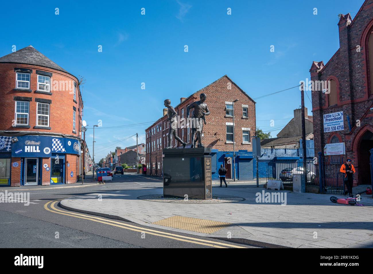 The Holy Trinity sculpture in the corner of Goodison Road and Gwladys Street outside Goodison Park on a quiet Sunday in Liverpool, UK Stock Photo