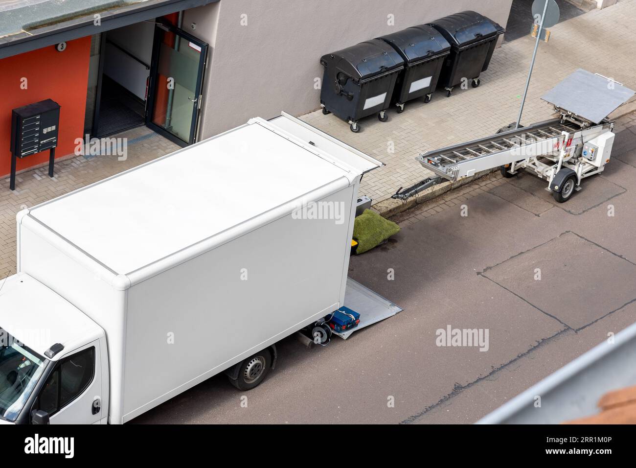 Mover service lifting ladder cargo crane platform vehicle van parked at