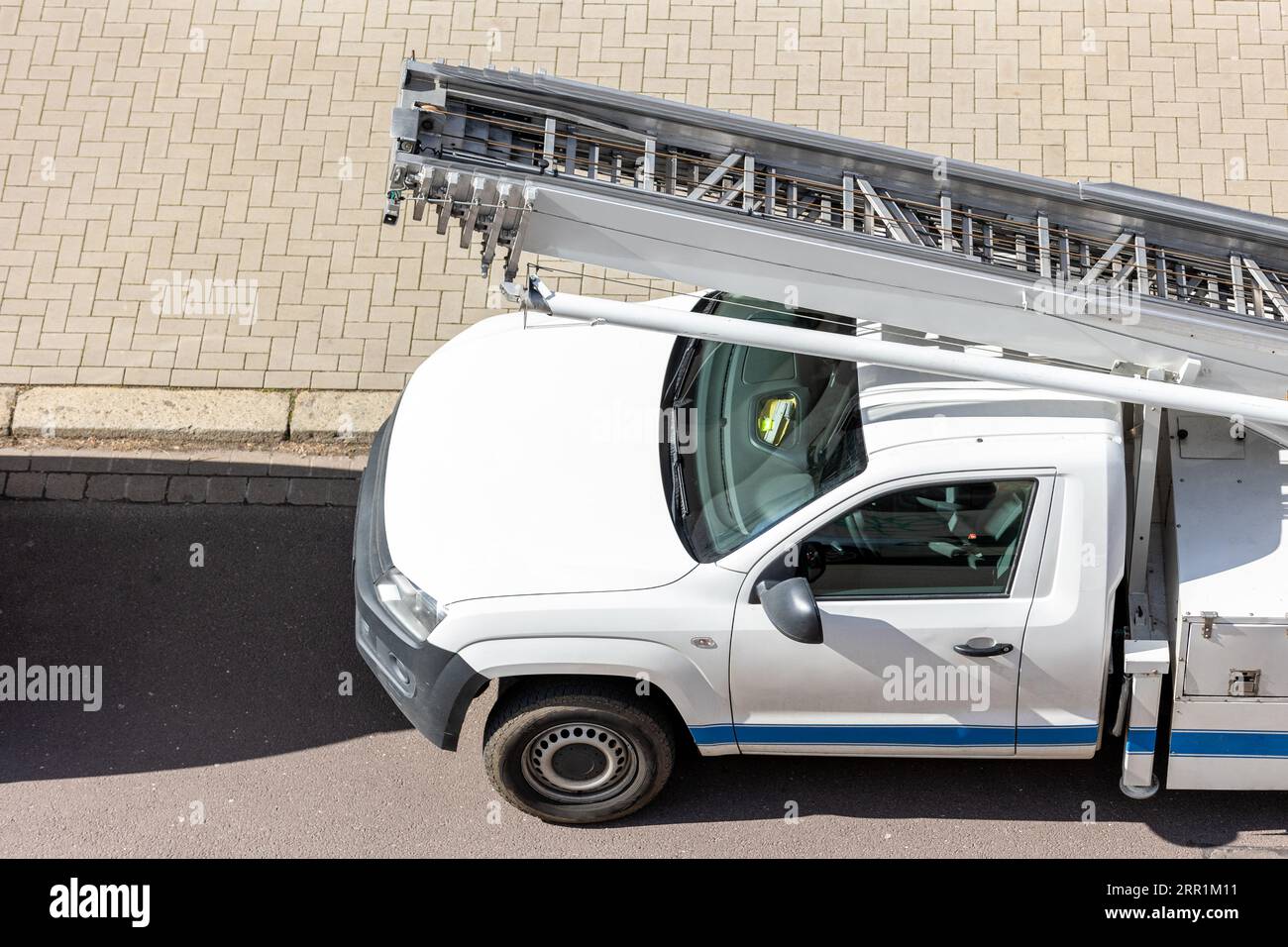 Mover service lifting ladder cargo crane platform vehicle van parked at