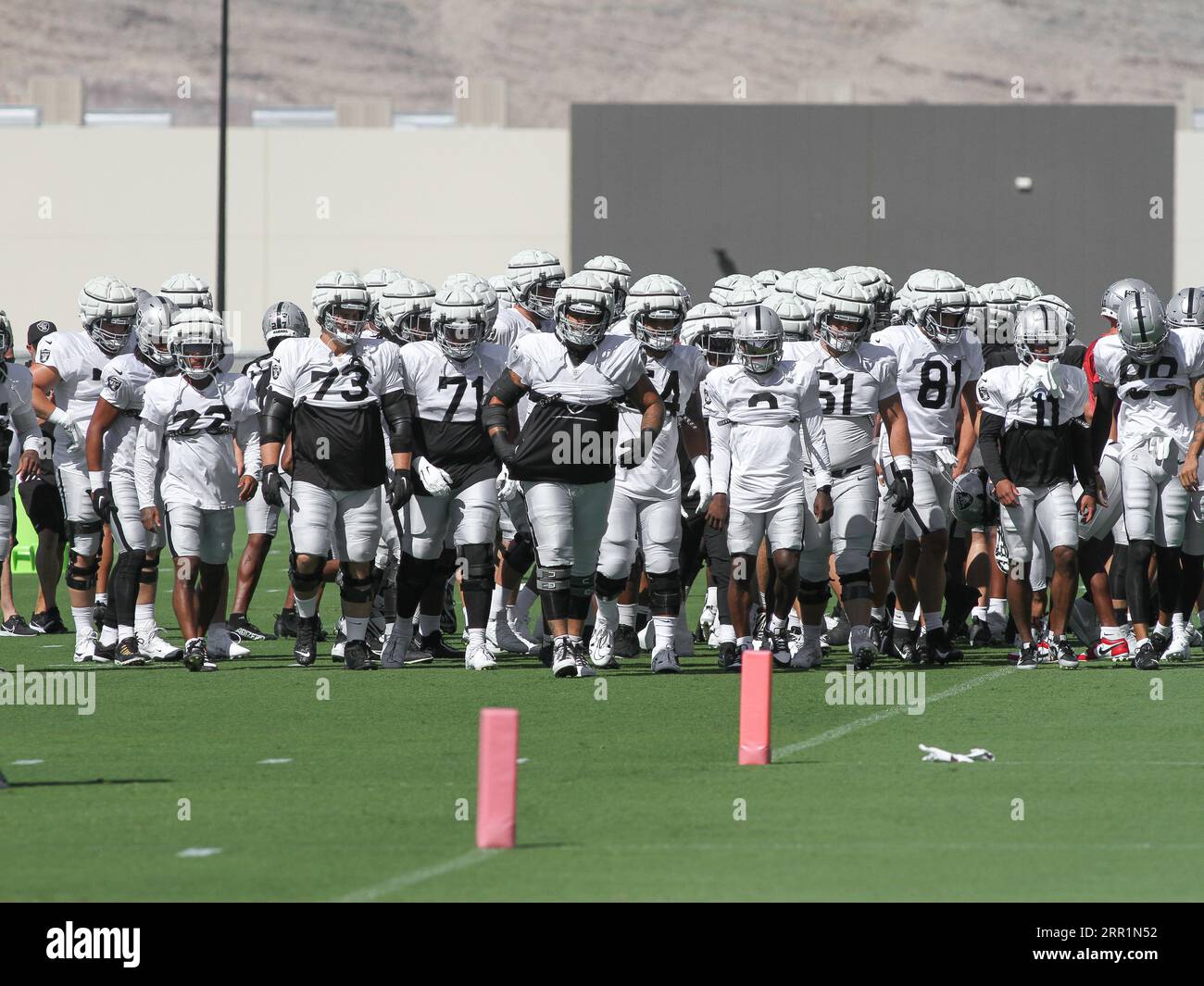 The team of Las Vegas Raiders football players practice on the field in the city of Las Vegas
