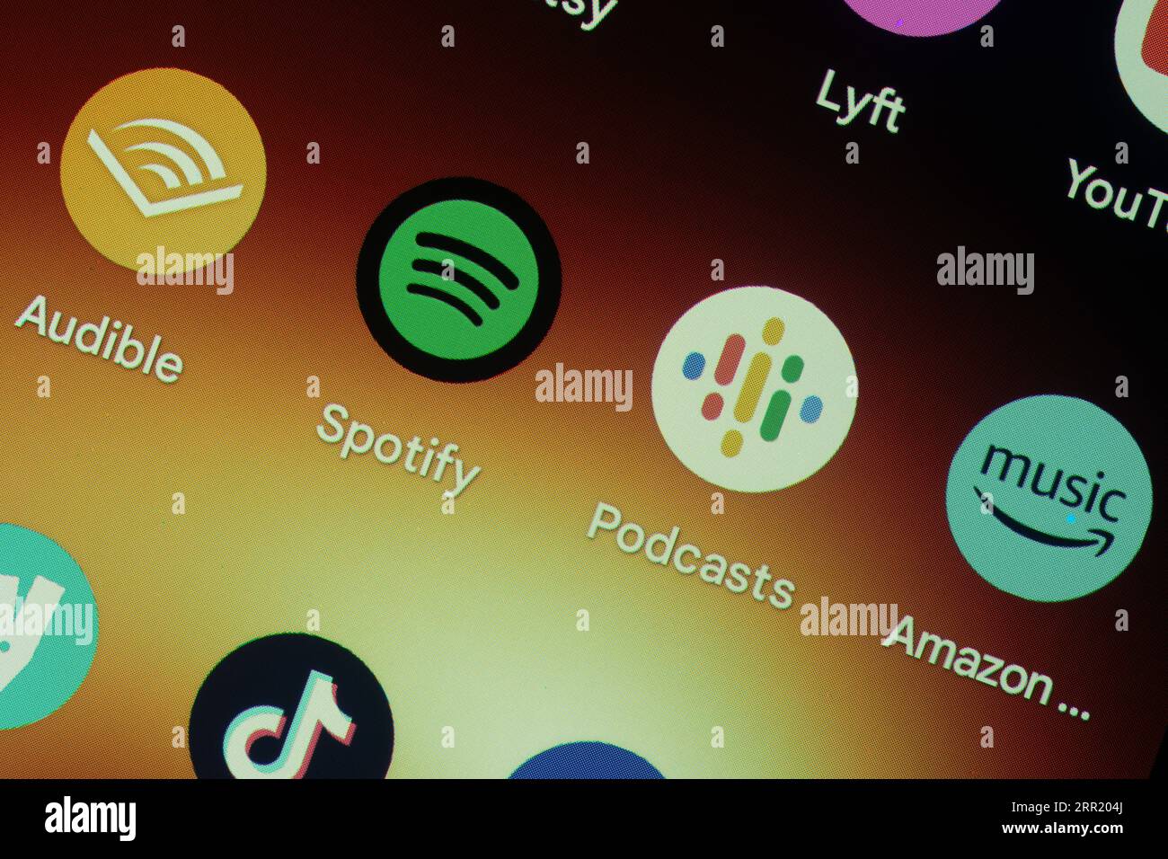 Podcast apps, Audible, Spotify, Google Podcasts Amazon Music. Android phone home screen. Close up macro. Stock Photo