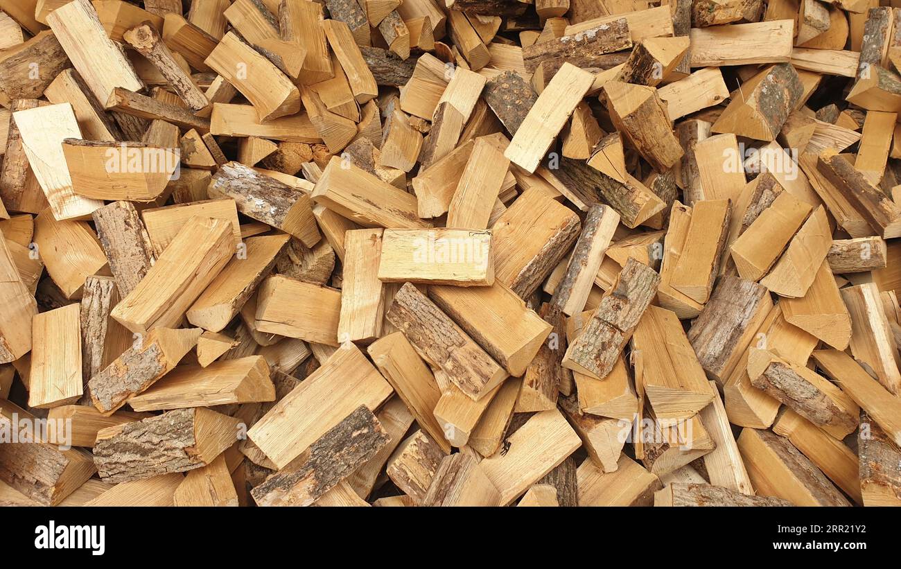 Firewood is prepared for sale and temporarily stored for drying. The