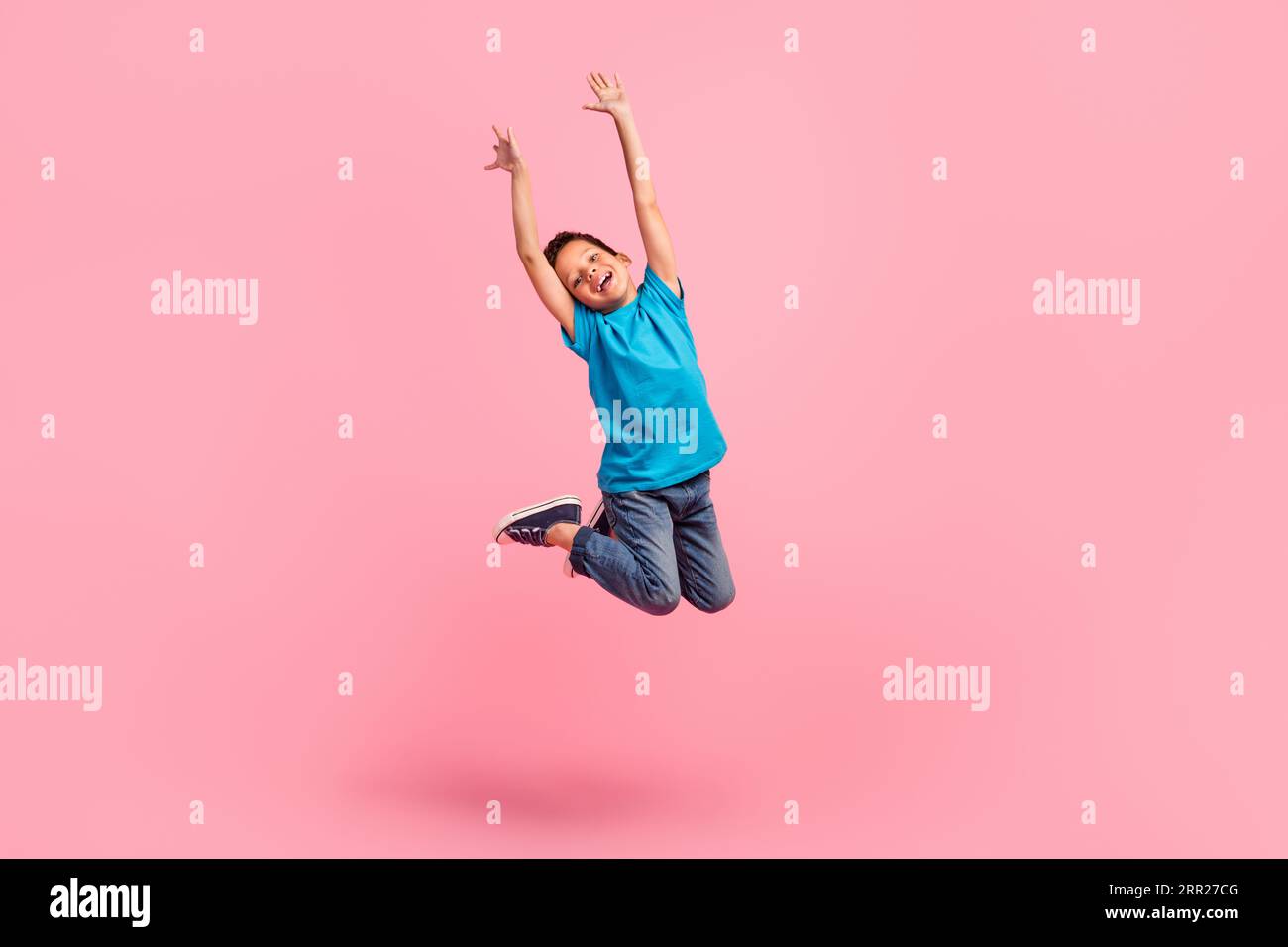 Full length photo of impressed cheerful small boy wear blue t-shirt ...