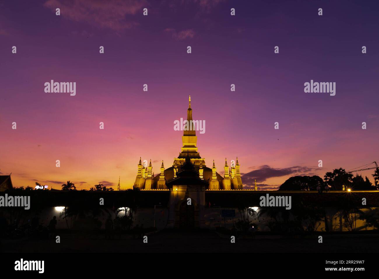201007 -- VIENTIANE, Oct. 7, 2020 -- Photo taken on Nov. 5, 2019 shows a night view of That Luang Stupa in Vientiane, Laos. Laos is the only landlocked country in Southeast Asia. In the central part of the country, the capital Vientiane is located on the alluvial plain on the Mekong River, suitable for fishing and plantation. The Lan Xang Kingdom, the first unified multi-ethnic nation in the history of Laos, moved its capital to Vientiane in the mid-16th century, and Vientiane gradually prospered. Photo by /Xinhua CitySketchLAOS-VIENTIANE KaikeoxSaiyasane PUBLICATIONxNOTxINxCHN Stock Photo
